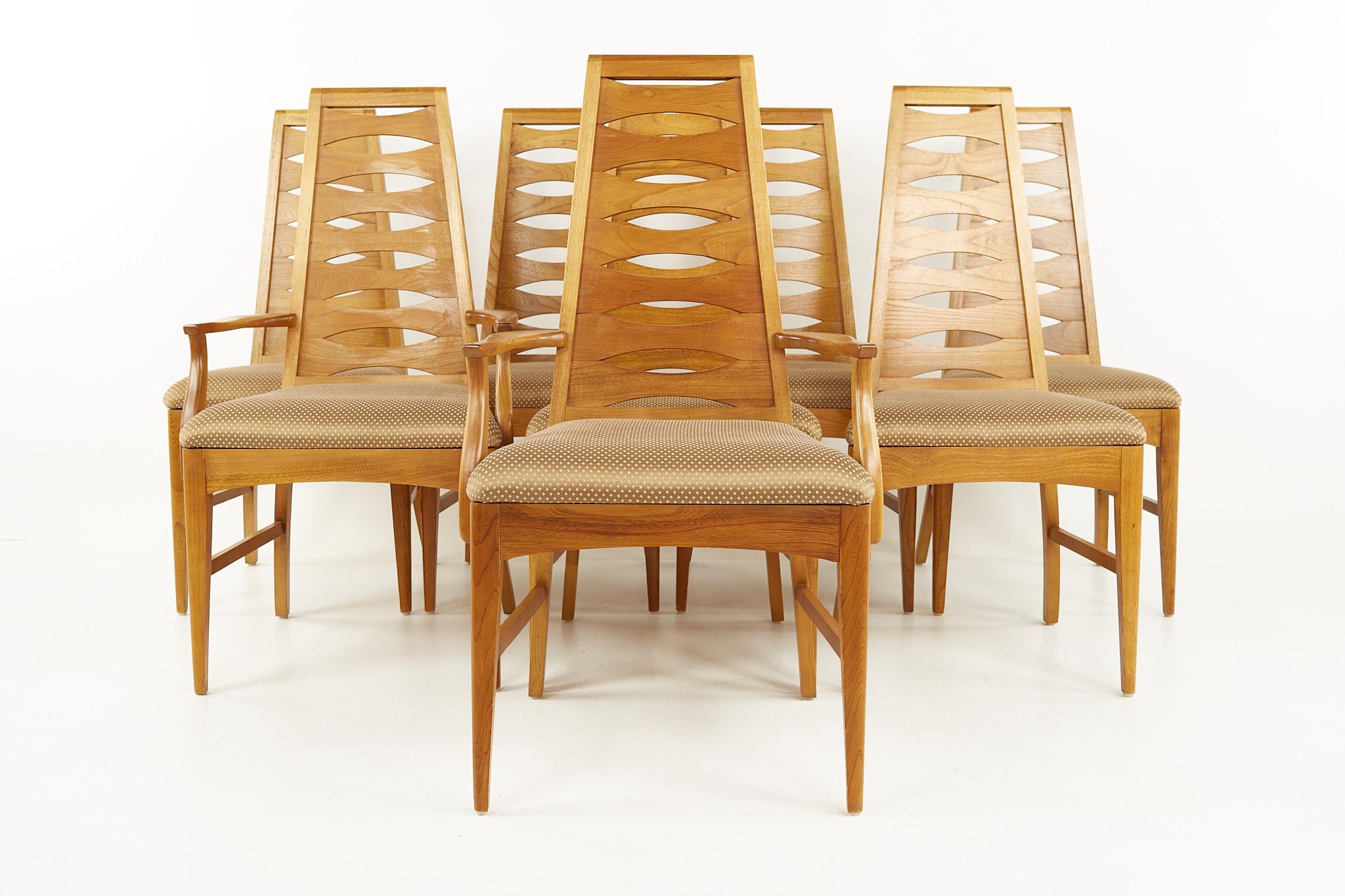 Young Manufacturing Mid Century Walnut Ladder Back Dining Chairs - Set of 8

Each chair measures: 22.5 wide x 22.5 deep x 42.25 high, with a seat height of 18.5 and arm height of 25 inches

All pieces of furniture can be had in what we call