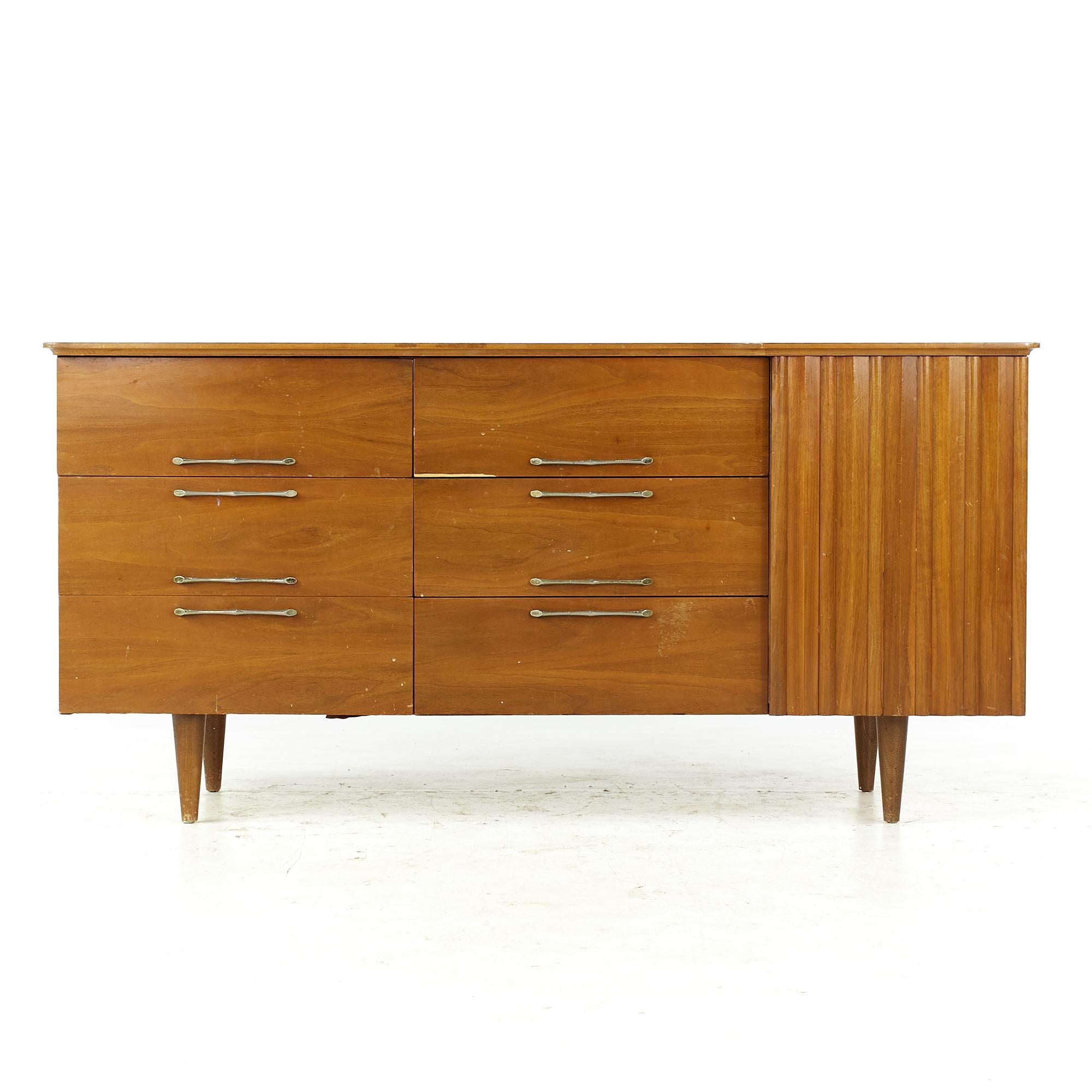 Young Manufacturing midcentury walnut lowboy dresser.

This lowboy measures: 62 wide x 20 deep x 30.5 inches high

All pieces of furniture can be had in what we call restored vintage condition. That means the piece is restored upon purchase so