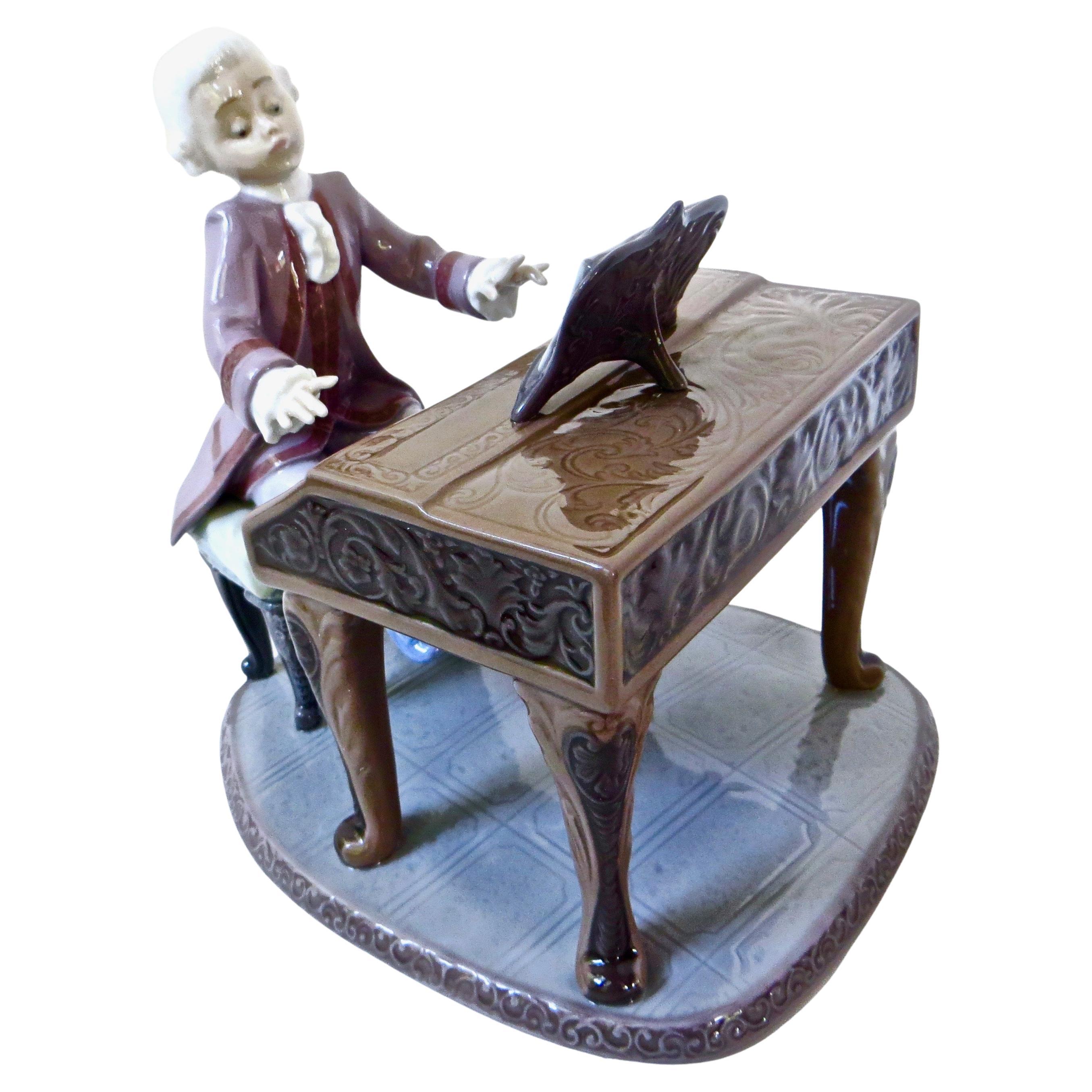 "Young Mozart" Porcelain Sculpture by Lladro, Spain. Depicts Mozart at The Piano For Sale