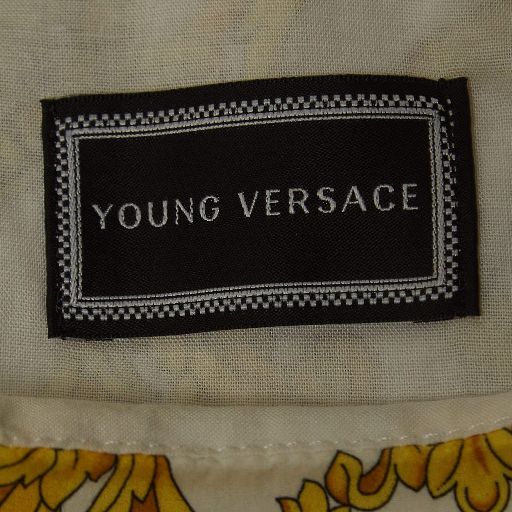 Giovane abito in cotone con stampa barocca nero/oro Versace (12 anni) In condizioni ottime in vendita a Dubai, Al Qouz 2