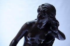 "Giovane donna in ascolto su una roccia" di Mathurin Moreau