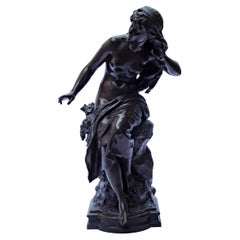 "Young woman listening on a rock" by Mathurin Moreau