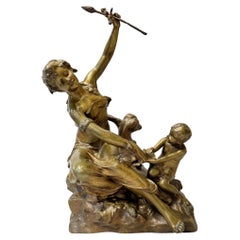 Young woman playing with a child, bronze group, by R. Larche, France circa 1880