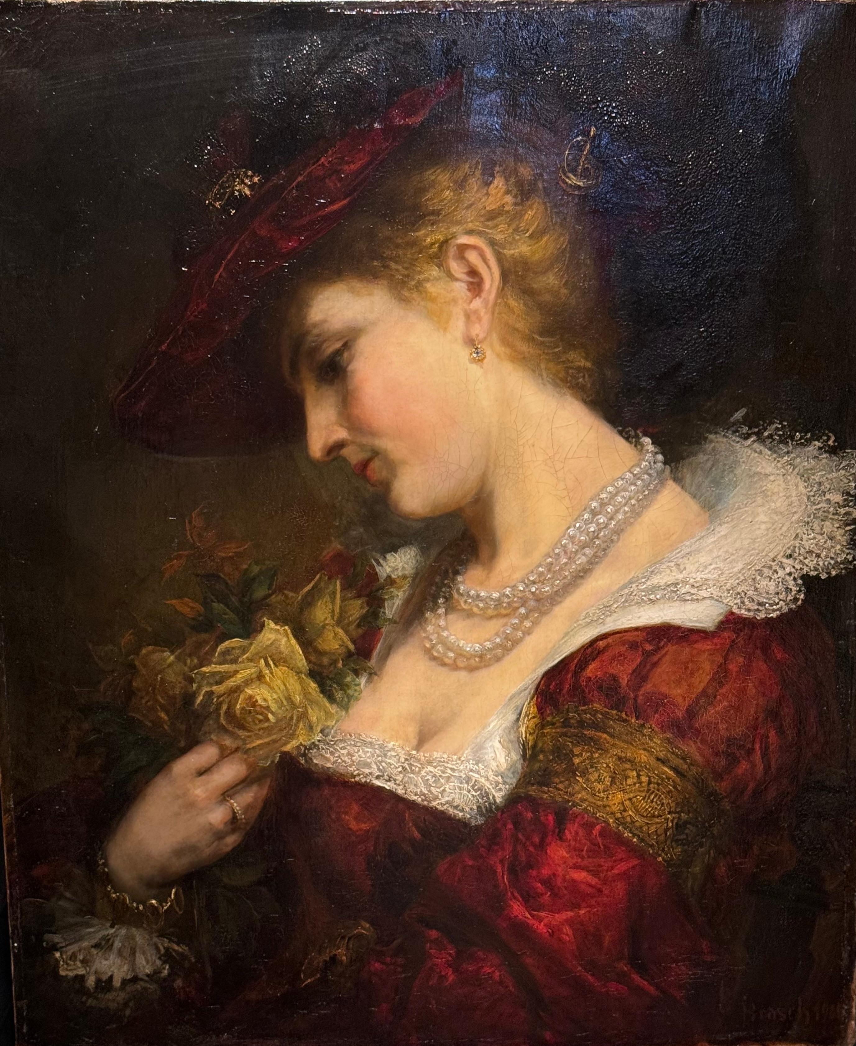 Olio su tela raffigurante una giovane donna, vestita in stile XVII secolo, è dipinta di profilo a sinistra, con in mano un bouquet di rose.
Vestita riccamente e adornata con splendidi gioielli, ammira i fiori che tiene nella mano destra.
Tela