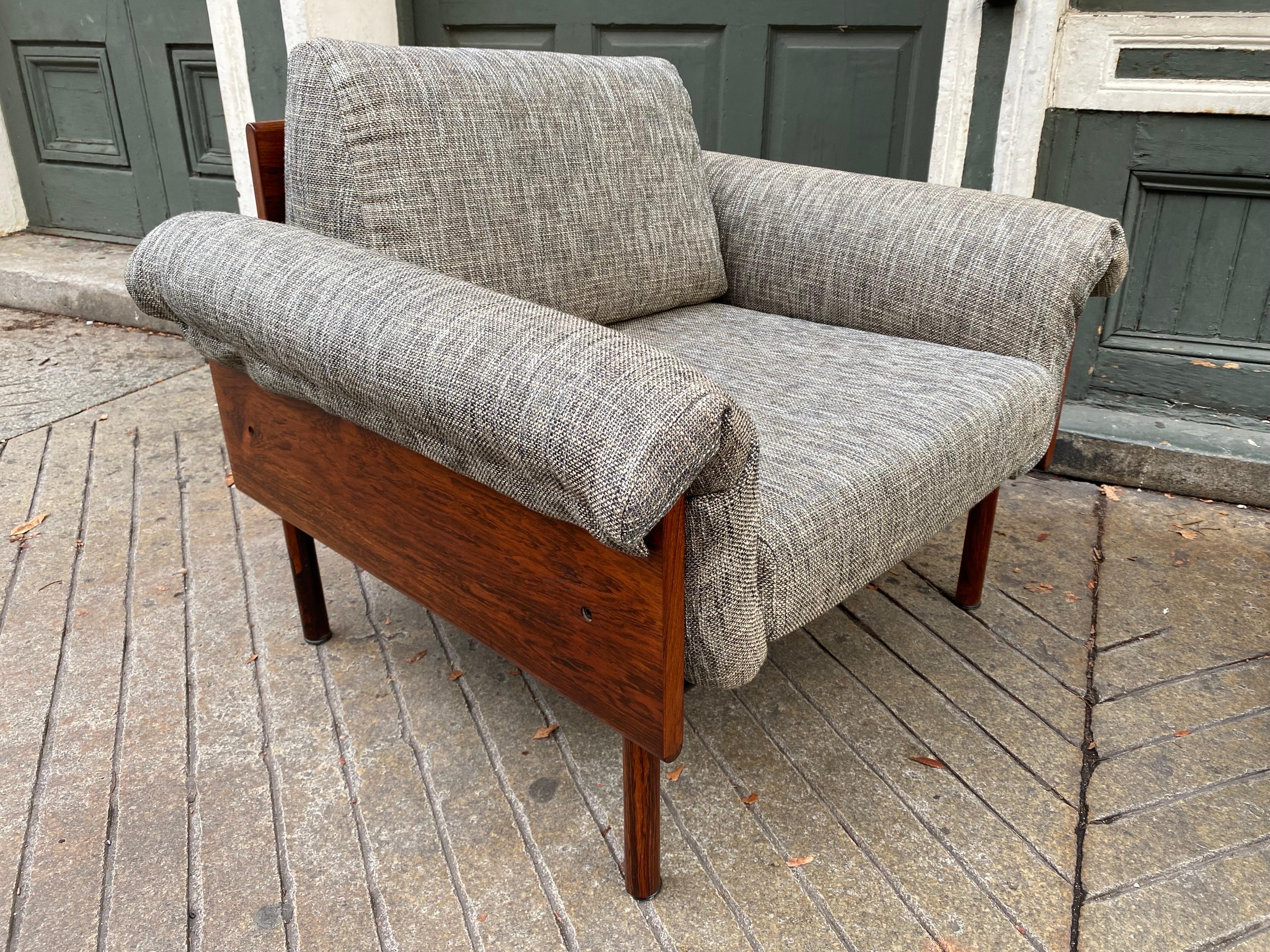 Yrjo Kukkapuro for Haimi Finland Rosewood Lounge Chairs.  Wood has all been refinished, new straps and Upholstery.  The wood is amazingly beautiful with heavy grain and color variations.  Chairs are very comfy and Loungy!