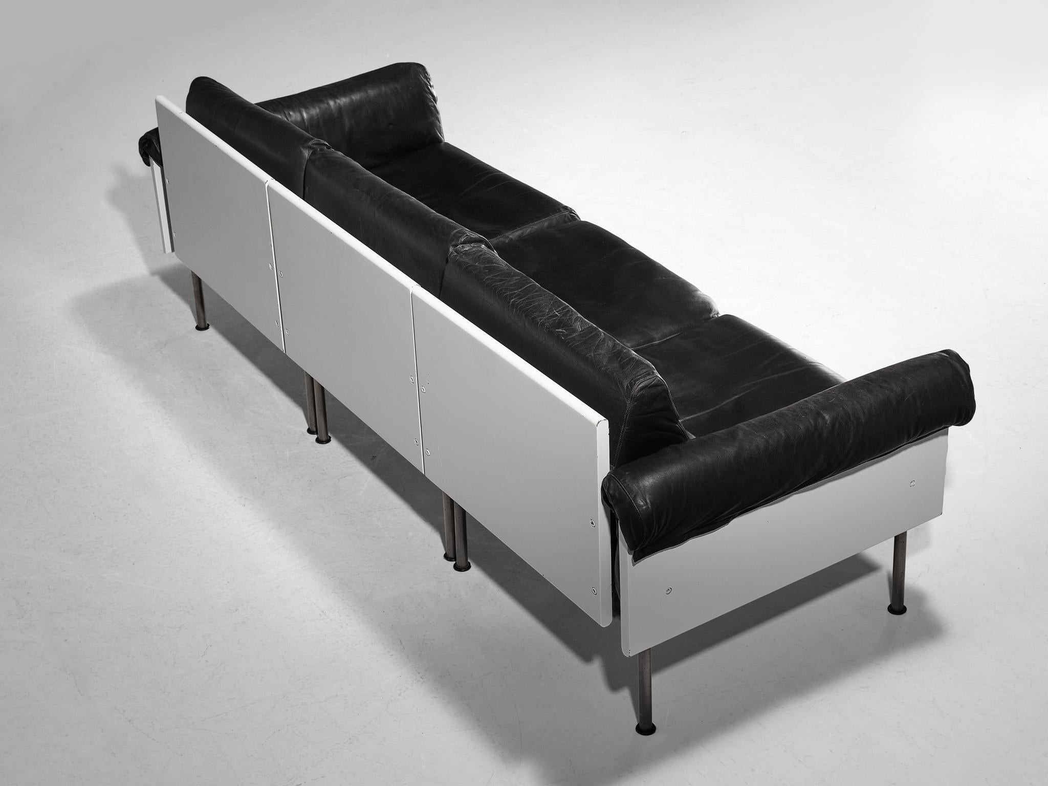 Yrjö Kukkapuro for Haimi Finland, modular sofa, leather, metal, wood, Finland, 1963

This streamlined sectional sofa is characterized by a simplistic, natural and modernist aesthetics. The design features a solid construction of clear lines and