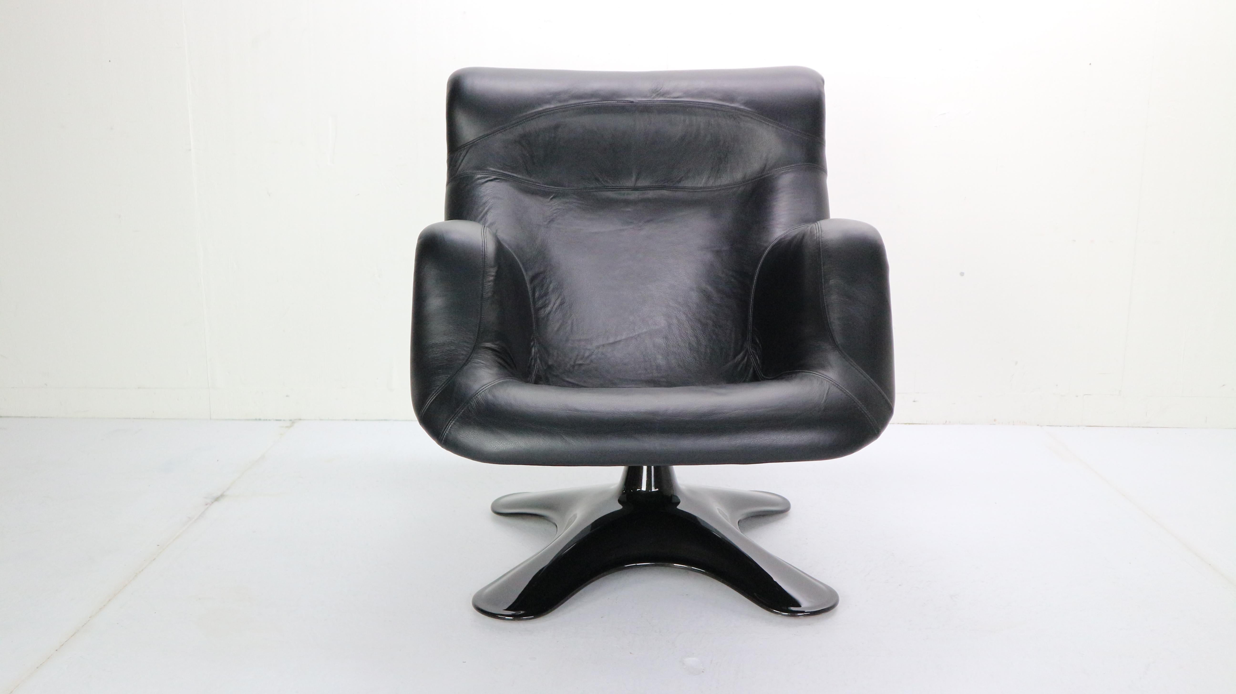 This exclusive lounge chair- 'Karuselli' is designed by Yrjo Kukkapuro for Haimi manufactured in 1960s, Finland. 
Organic shaped lounge chair is made of black leather newly upholstered and has a black fiberglass seat shell& base. The base is