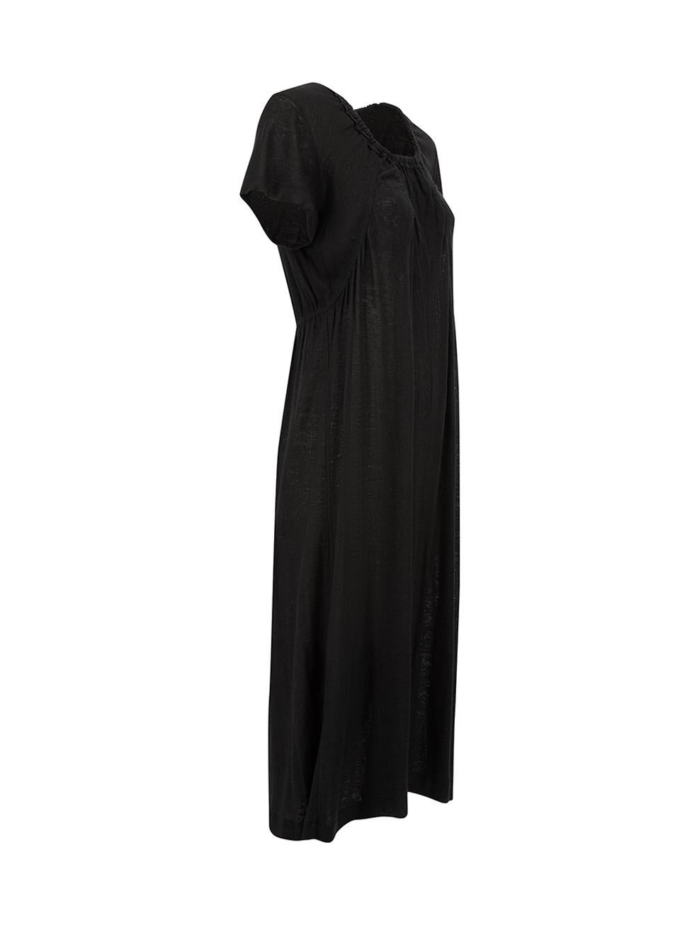 CONDITION is Very good. Minimal wear to dress is evident. Minimal wear to fabric with some pilling to be seen throughout on this used Y's designer resale item.



Details


Black

Linen

Midi dress

Ruched elasticated neckline

Short sleeves

Round