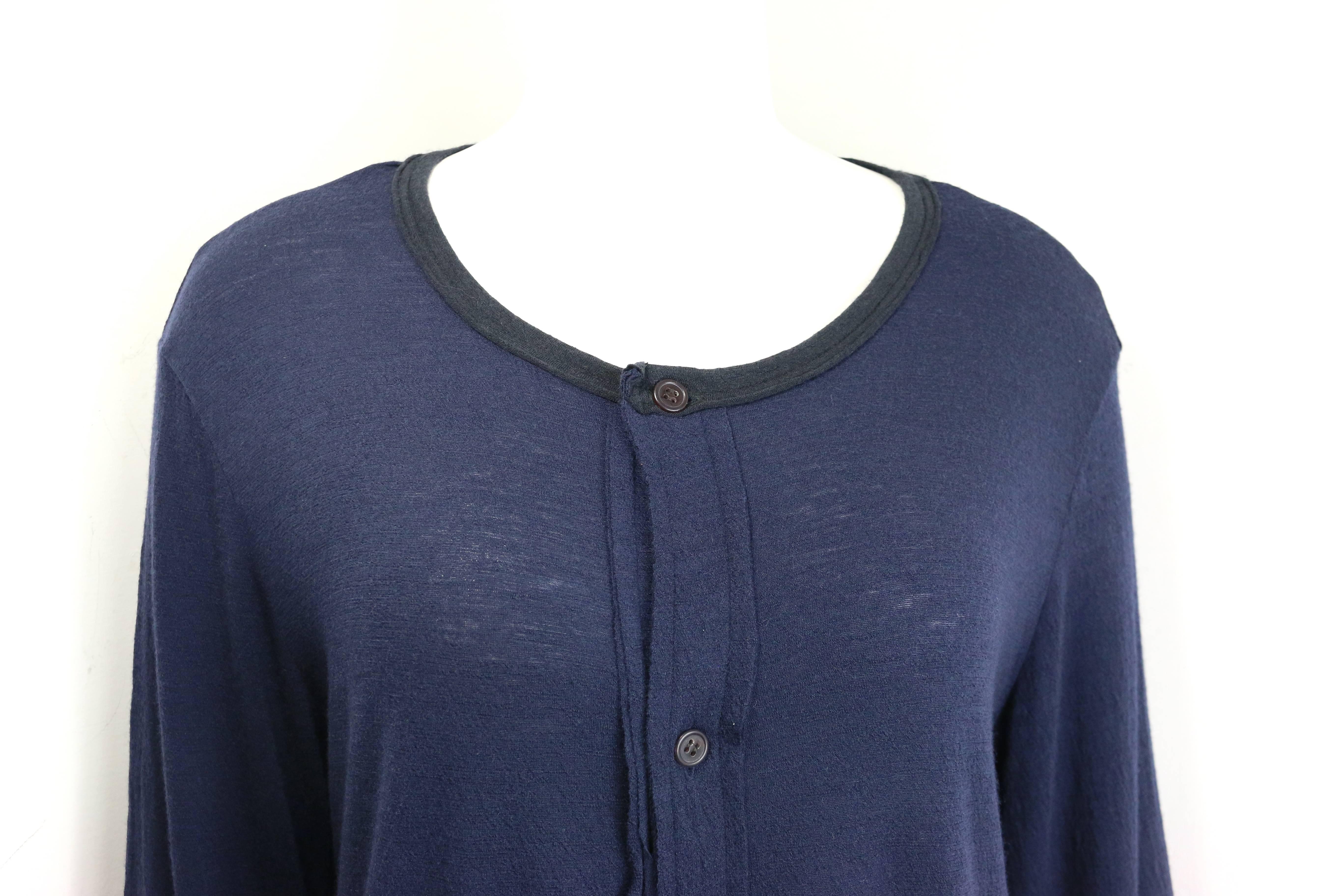 - Y's by Yohji Yamamoto dark navy wool long sweater. It can be also worn as a dress.  

- Black seaming round neckline and hem. 

- Buttons closure. 

- Black ribbed cuff when roll up sleeve. 

- Size 3 Japan. 

- 100% Wool. Cuff: 90% Acrylic, 10%
