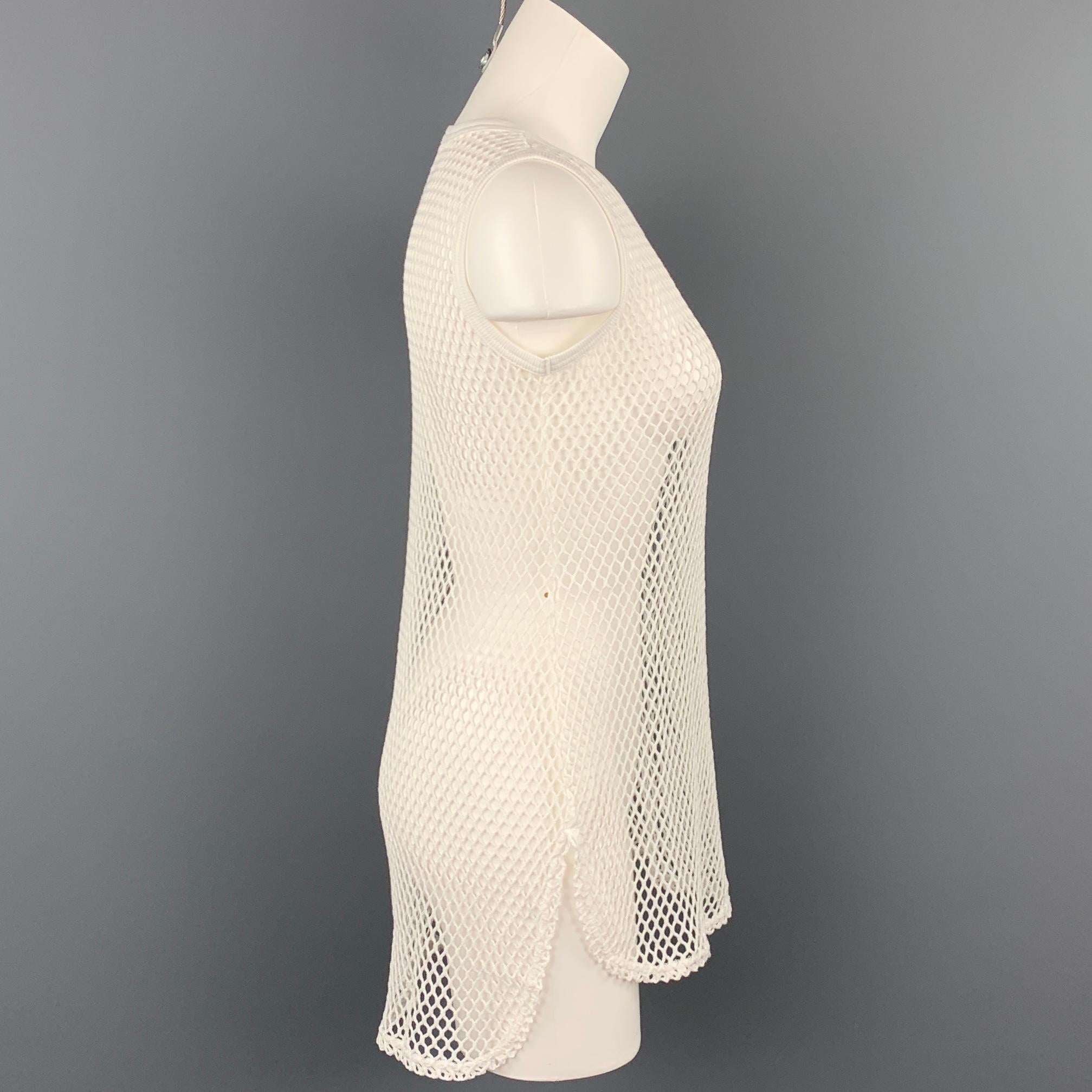 Y's by YOHJI YAMAMOTO tank top comes in a white mesh cotton featuring a sleeveless style and a crew-neck. Made in Japan.

New With Tags.
Marked: 2
Original Retail Price: $380.00

Measurements:

Shoulder: 13.5 in.
Bust: 30 in.
Length: 28.5 in.  