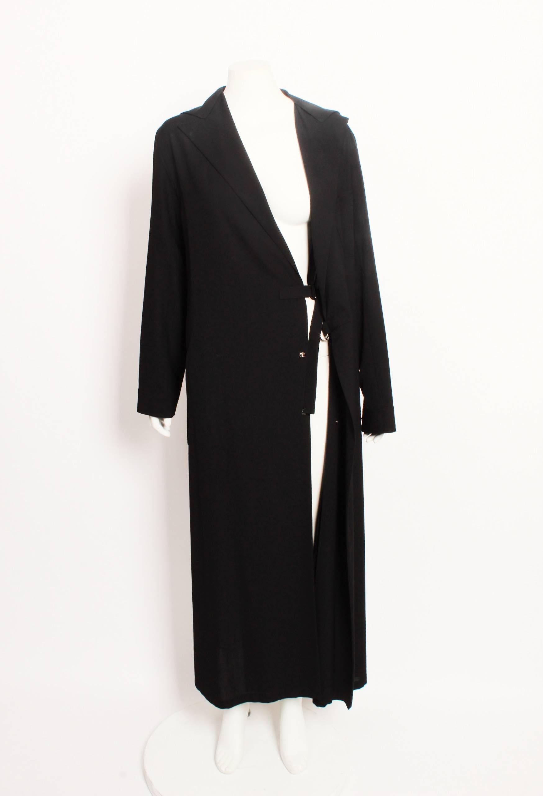 Yohji Yamamoto black wool blend coat with buckle detail.
Y's Collection. Made in Japan. Size 4.