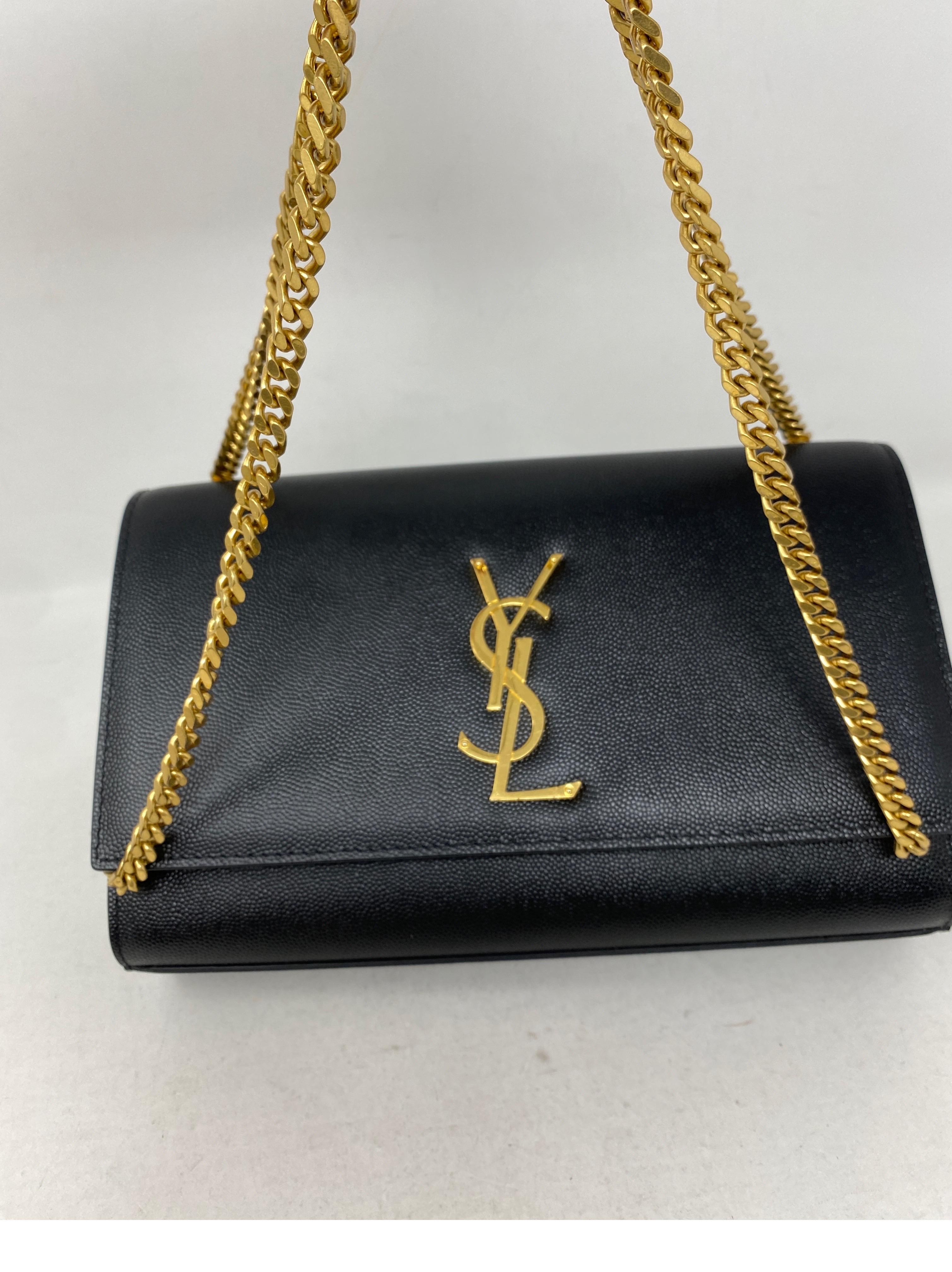 Yves Saint Laurent Black Crossbody Bag. Gold hardware. Black leather purse can be worn longer as a crossbody bag or doubled as a shoulder bag. Also can be tucked in as a clutch. Excellent like new condition. Classic style by YSL. Includes dust