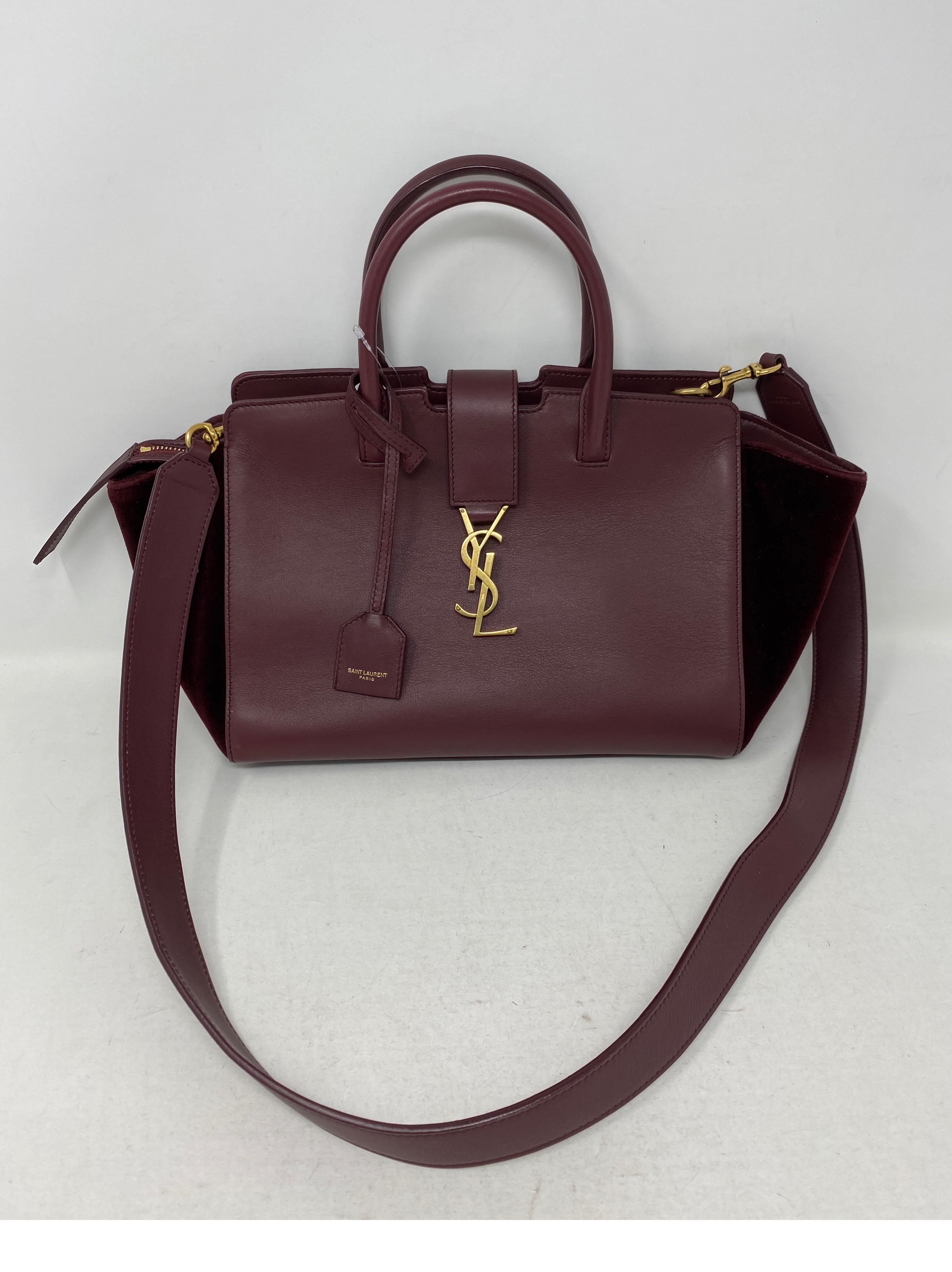 YSL Cabas Burgundy Bag. Gold hardware. Can be worn 2 ways. Good condition. Guaranteed authentic. 