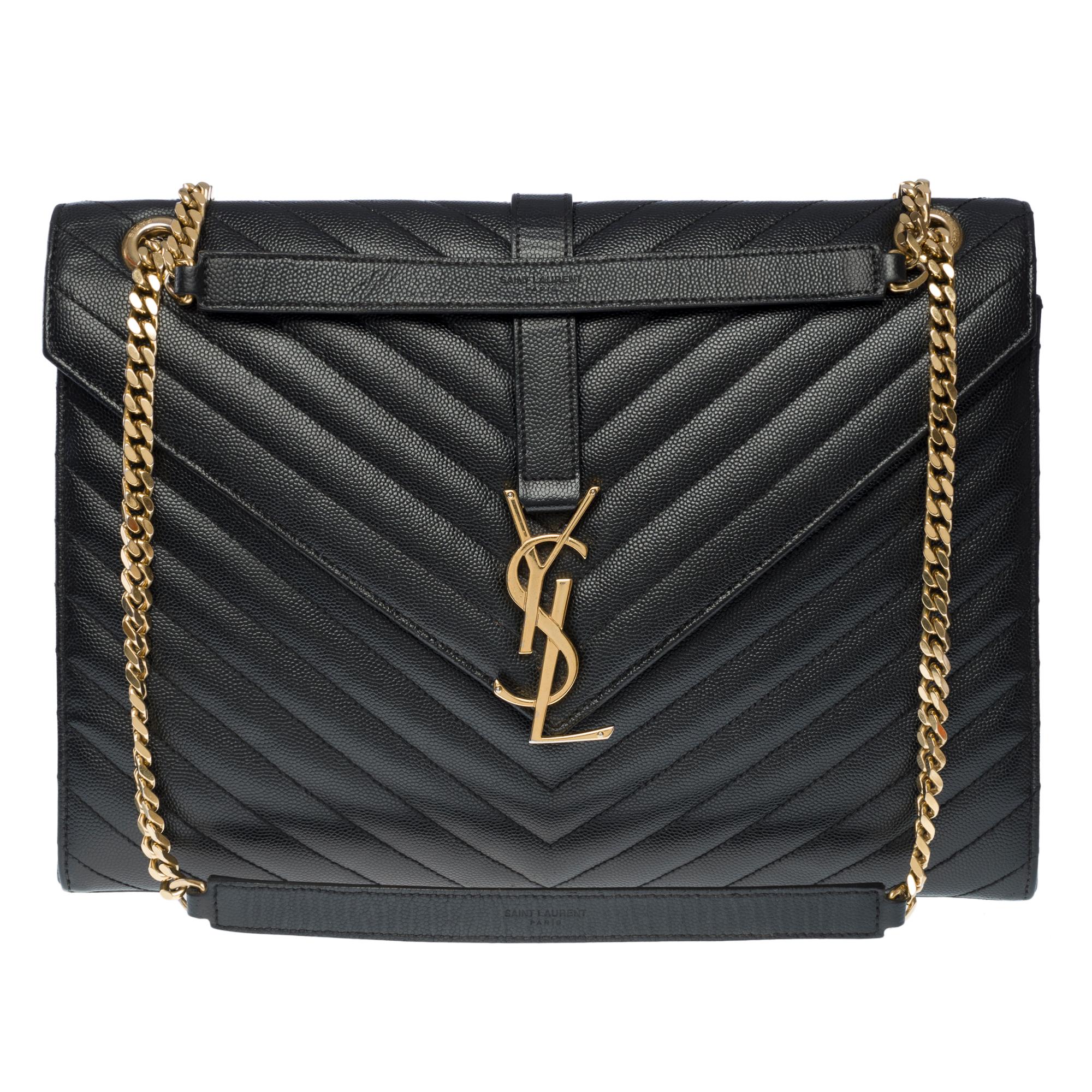 Superb​​ ​​YSL​​ ​​Envelope​​ ​​GM​​ ​​shoulder​​ ​​bag​​ ​​in​​ ​​black​​ ​​grained​​ ​​leather​​ ​​chevron,​​ ​​gold​​ ​​metal​​ ​​trim,​​ ​​metal​​ ​​shoulder​​ ​​strap​​ ​​single​​ ​​or​ ​doubled​ ​allowing​ ​a​ ​shoulder​ ​or​ ​crossbody​