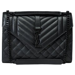 Used YSL Envelope MM shoulder bag in black quilted grained  leather , BHW