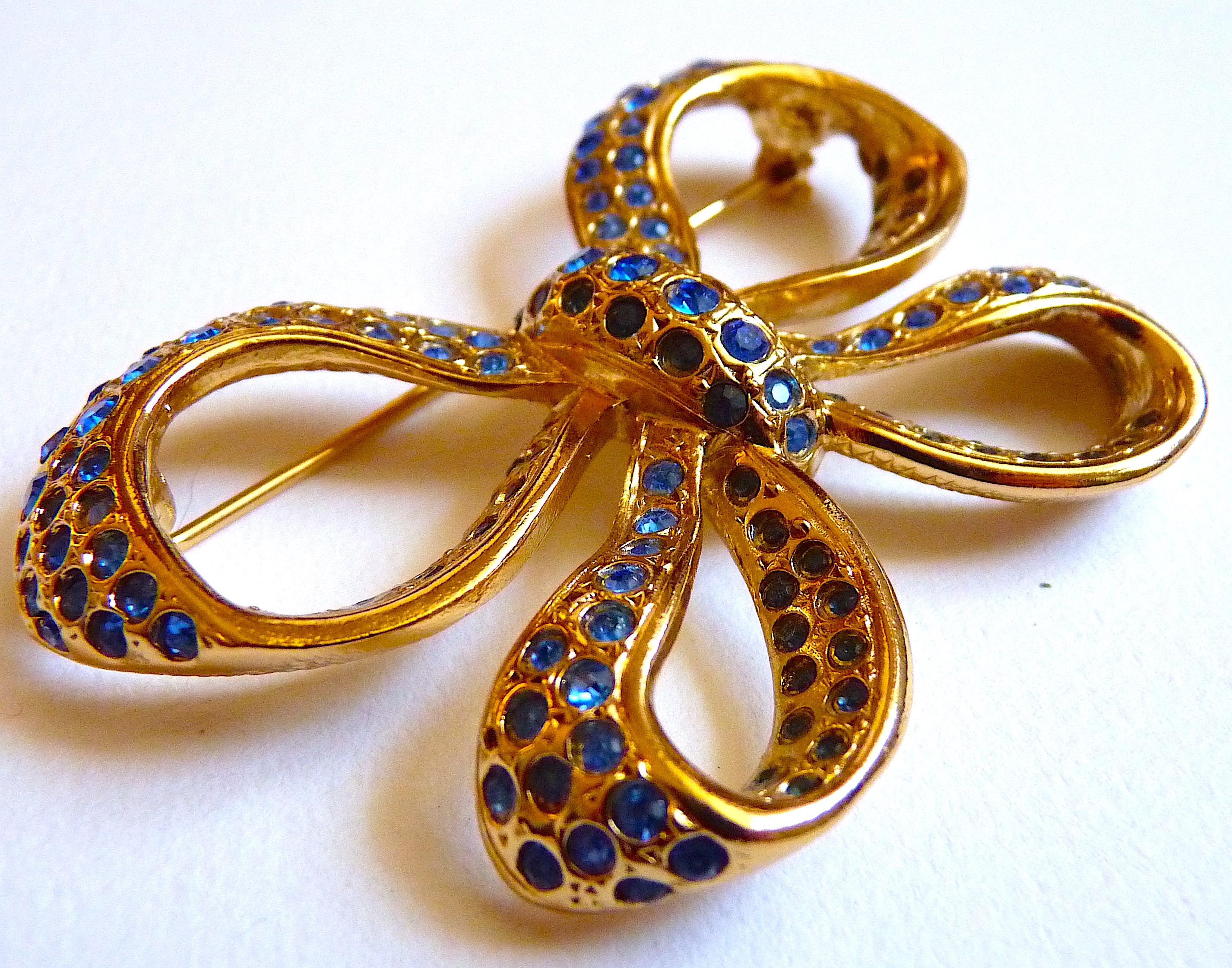 Women's YSL Gilt Metal and Blue Crystal Stones Bow Brooch, Vintage 1980s For Sale