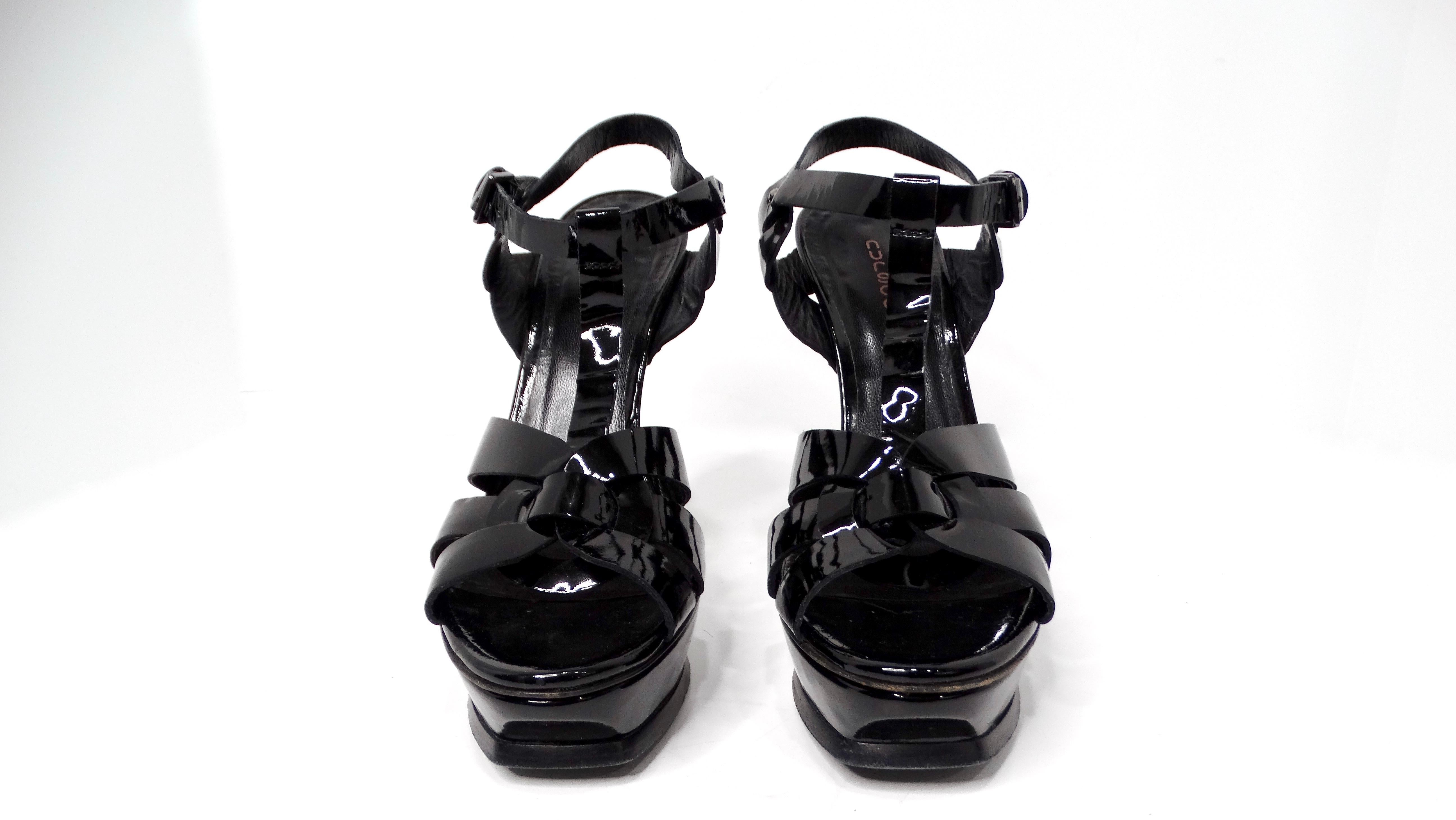 Step into unparalleled elegance with the YSL Inspired Black Patent Leather Platform High Heels. These striking shoes exemplify modern luxury and serve as a versatile addition to any high-fashion wardrobe. Crafted from premium black patent leather,
