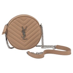 YSL - Sac à appareil photo rond caviar beige, état neuf