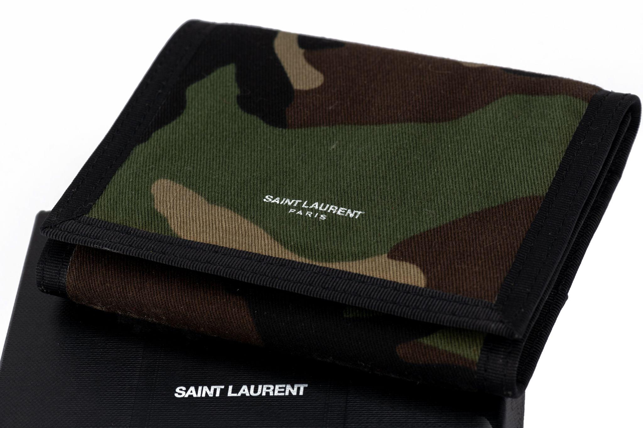 YSL new camouflage canvas wallet with multiple compartments.
Comes with booklet, original dustcover and box.