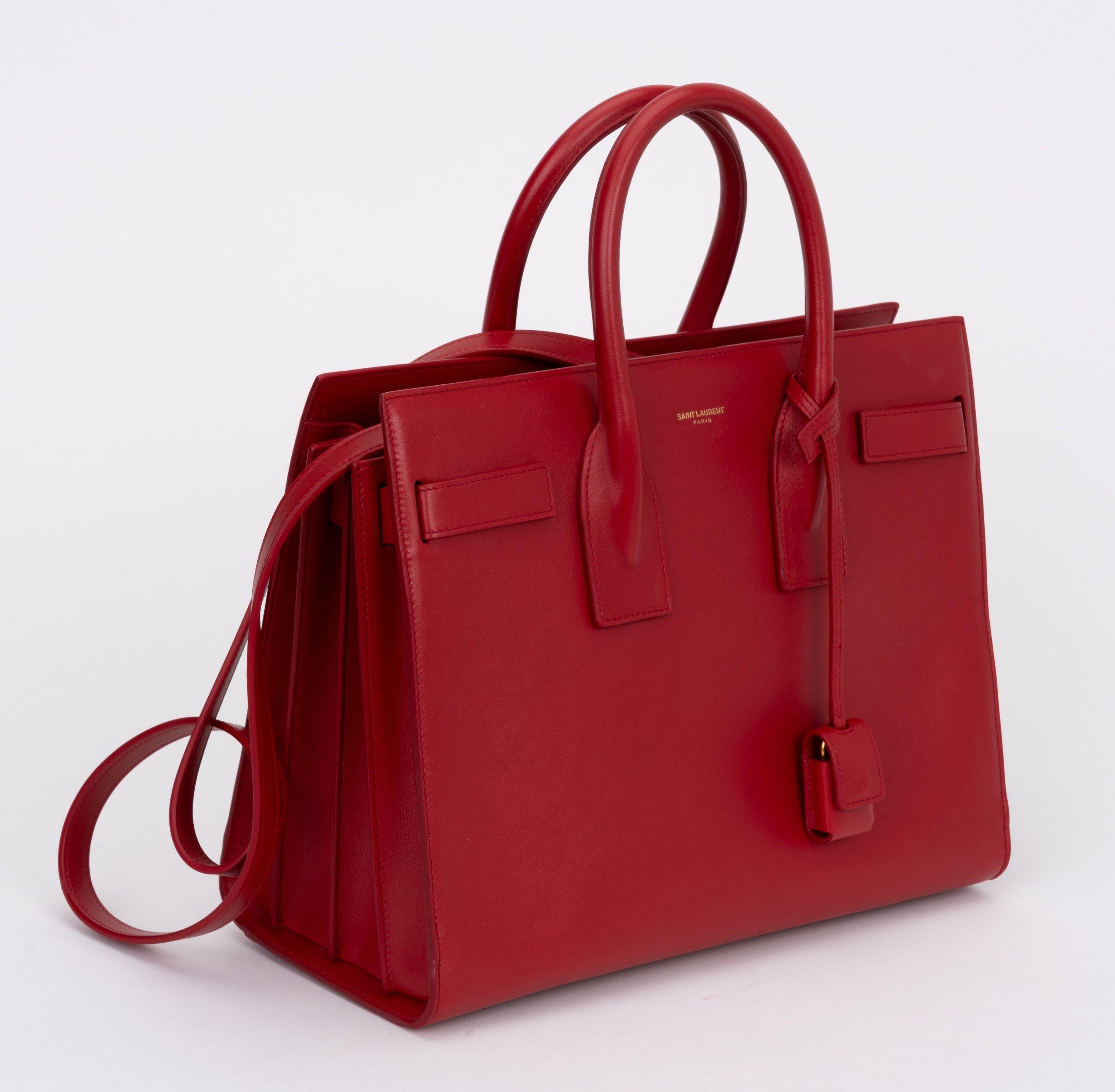 YSL new red box leather sac de jour two way tote. Clochette, tirette, lock, 2 keys. 
Store retail $3300. Handle drop 4.5