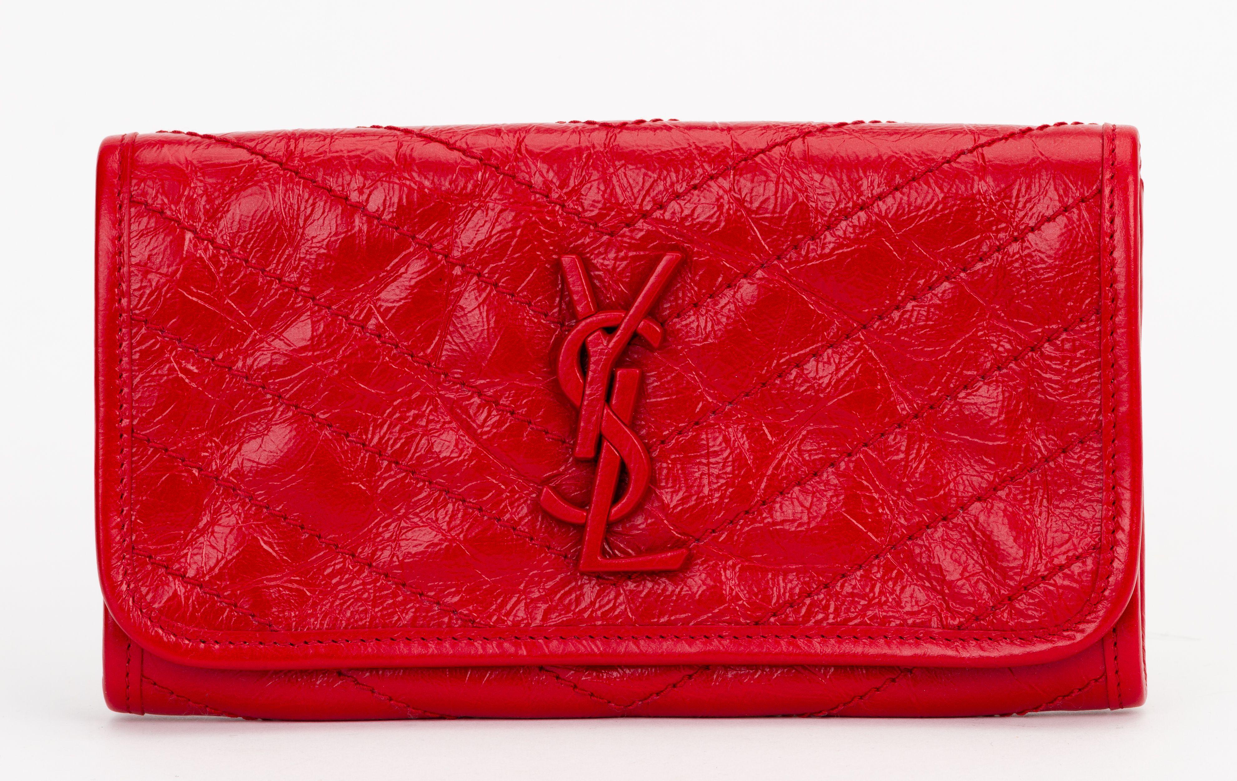 YSL authentic long red wallet in cracked leather and front logo. Can be used as a small clutch. Comes with original dust cover and box .