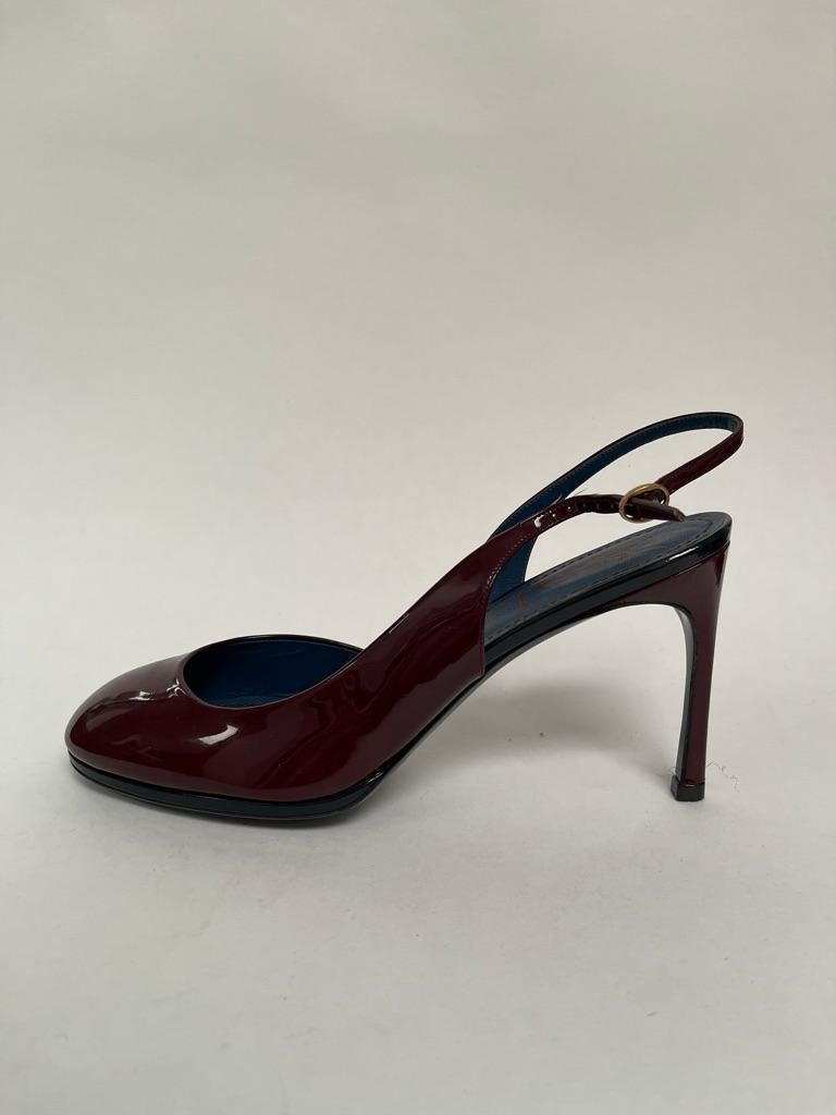 Beautiful port wine color patent round toe sling back, lower heel makes these perfect for work.