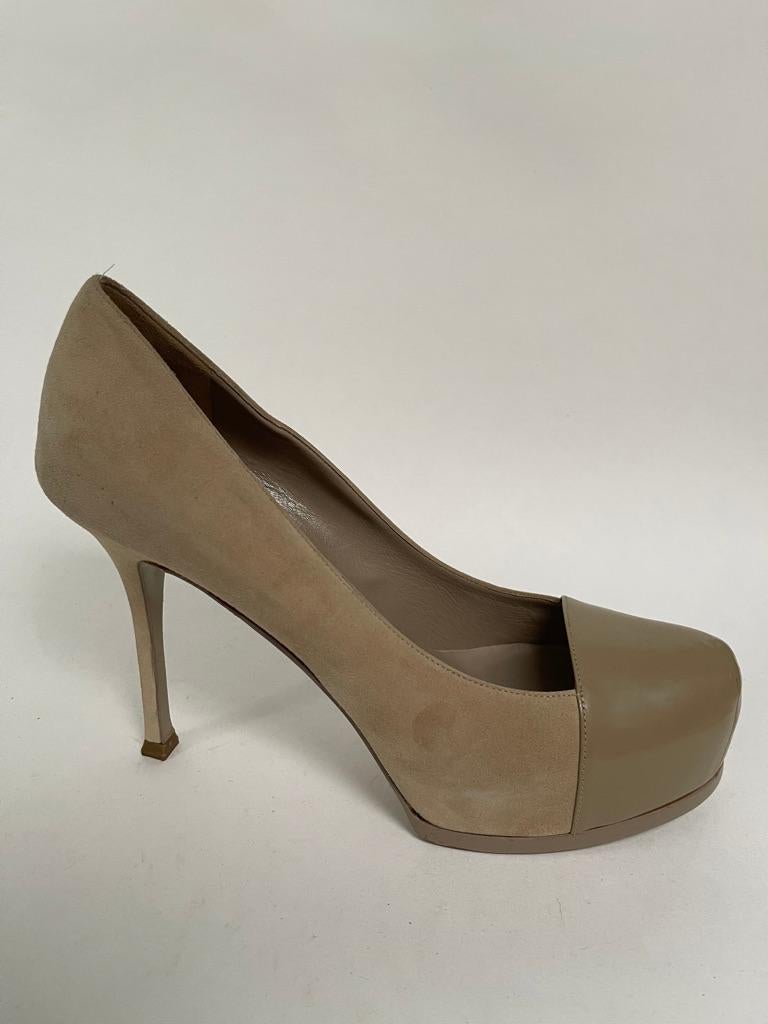 Nude suede platform with leather toe cap, stiletto heel.