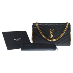 YSL Pochette Cassandre classic shoulder bag in Black grained calf leather, GHW