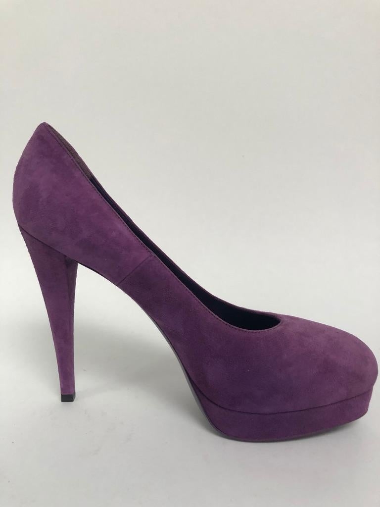 Beautiful soft purple suede pump with concealed platform.