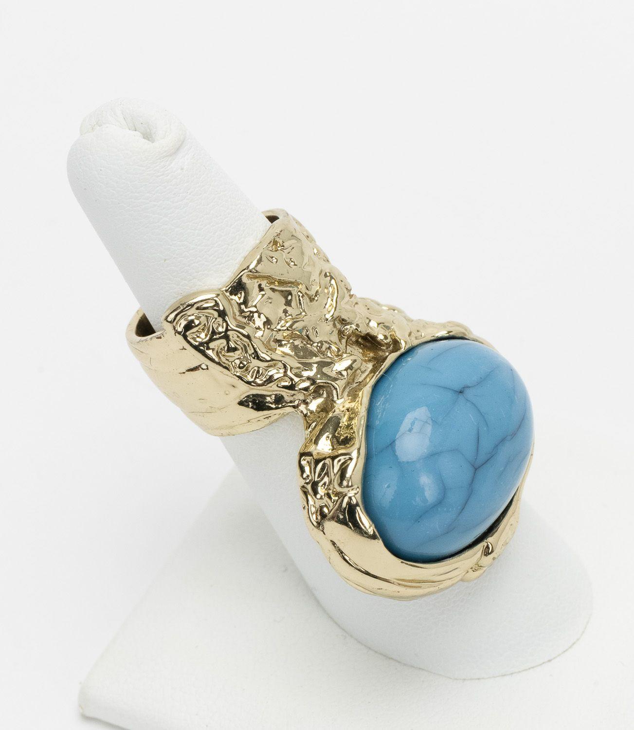 Saint Laurent Ring in Gold with a big Turquoise stones. Comes in size 6. In excellent condition.