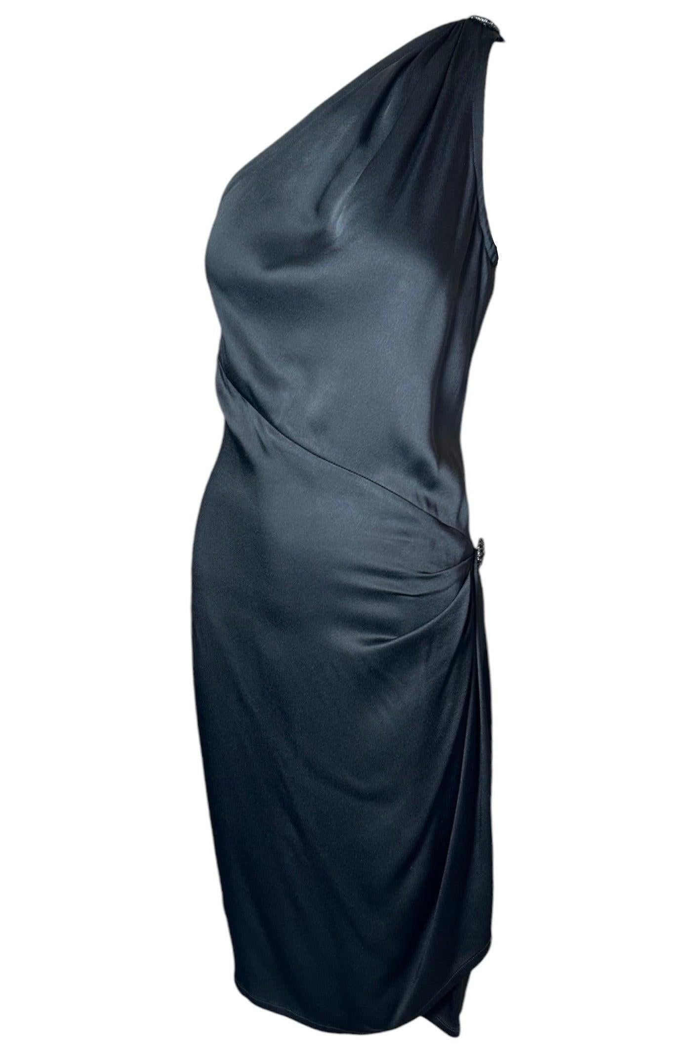This Yves Saint Laurent Rive Gauche dress screams elegance and 1930s slinky glamour. Clearly inspired by the bias cut gowns of 30s decadence which would go on to inspire the likes of Galliano during the 90s as well.  This dress unique is the