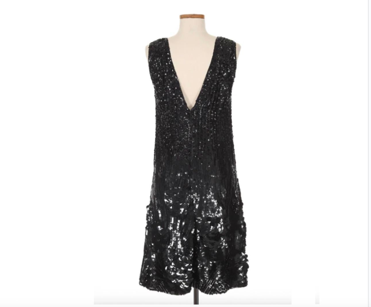 VINTAGE GRACE NY

YSL Rive Gauche Black Sequin Dress. This dress is a dazzling YSL creation, with a modernized nod to a silhouette reminiscent of a 1920s flapper. Along with the mesmerizing black sequin throughout the entire dress, this piece is