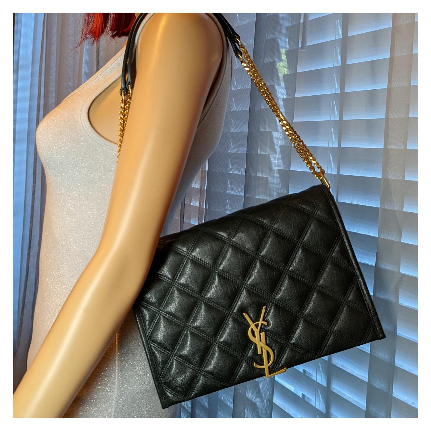 Saint Laurent Becky Mini Chain Bag in carré-quilted lambskin leather in dark green. The bag features polished gold hardware, chain shoulder straps and a gold YSL emblem on the front flap. The flap opens to a black fabric interior with zipper and