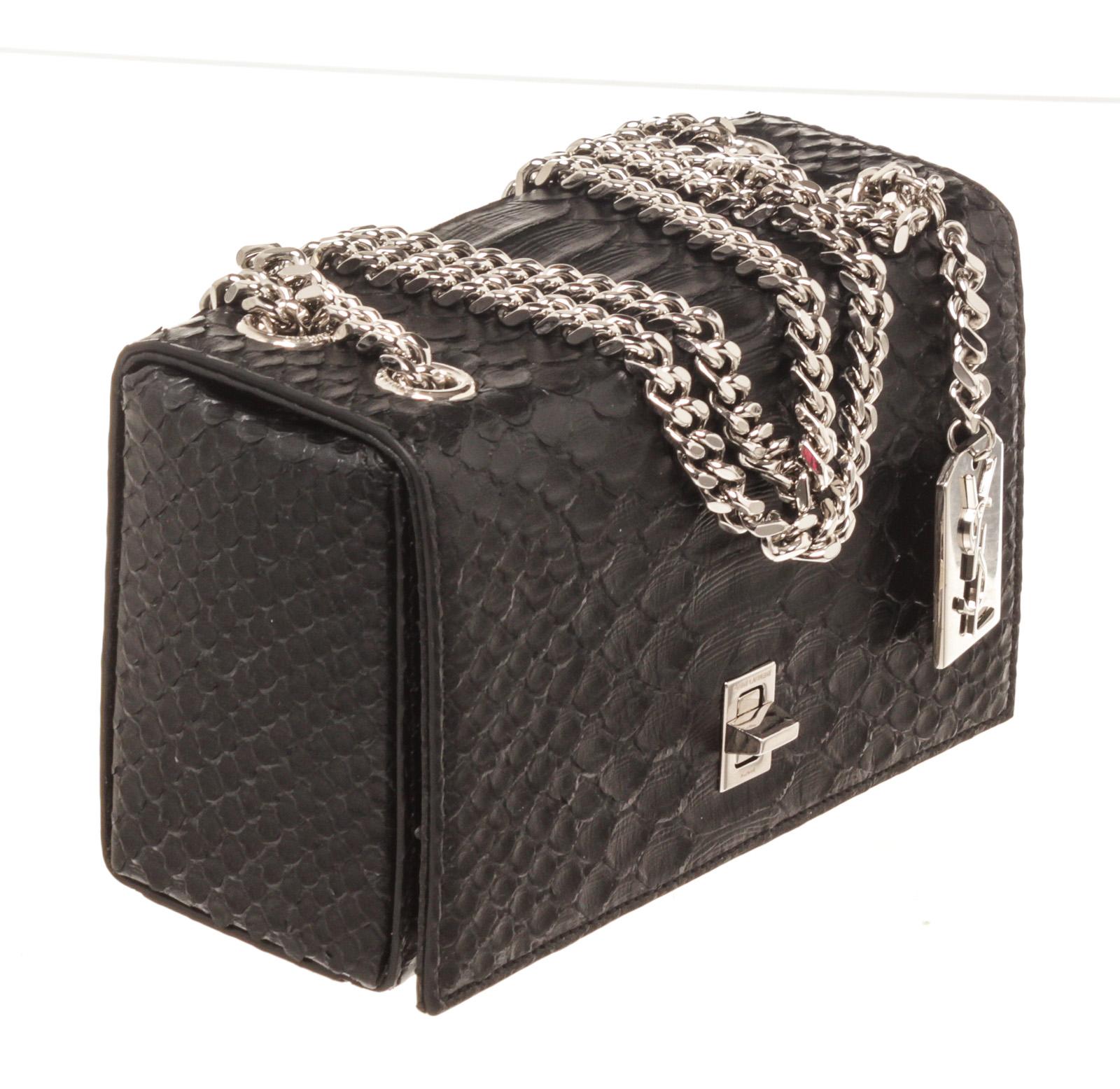 YSL Saint Laurent Black Python Embossed Minaudiere Camera Bag withÂ  brown leather trim, features a commanding YSL monogram logo at the front, bronze-tone hardware. Its zip closure opens to a brown fabric interior with slip pocket.

35872MSC