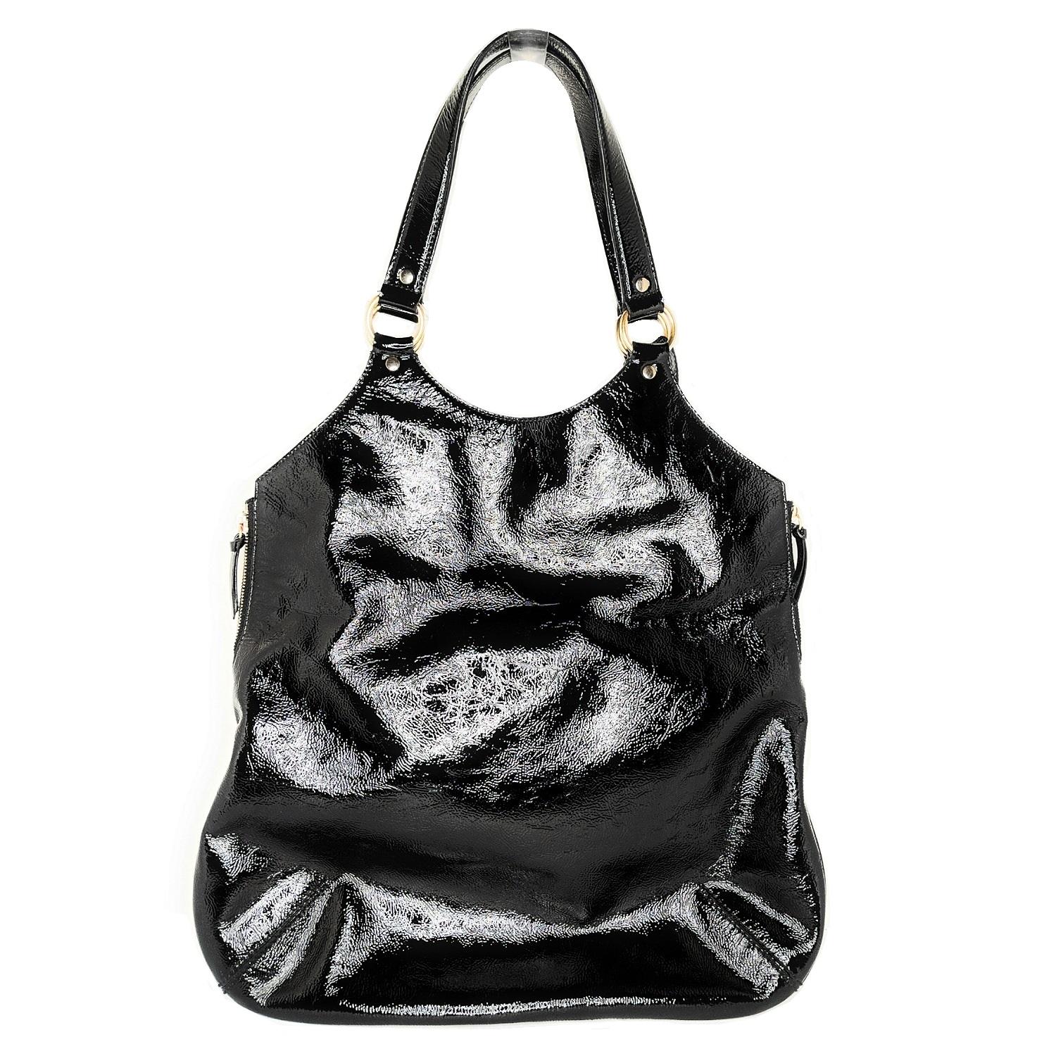 This stylish tote is crafted of fine black patent leather. The bag features leather strap top handles with polished brass hardware. The top opens with magnetic snap and side zippers to a satin interior with zipper and patch pockets.

Designer: YSL