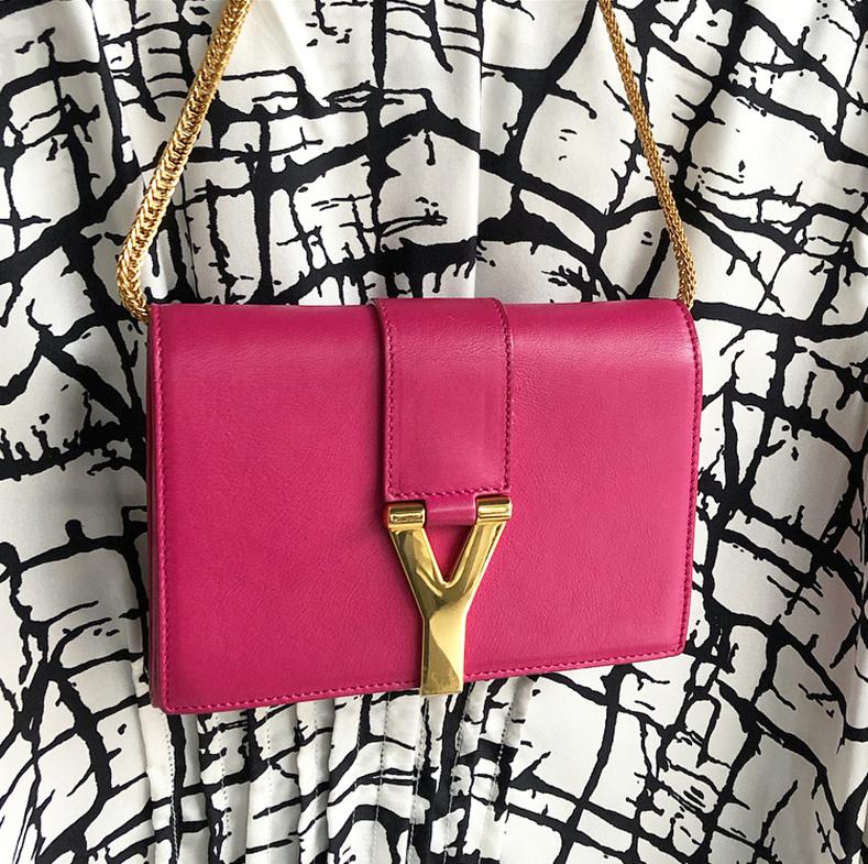 YSL Saint Laurent Pink Mini Sac Y Ligne Crossbody Bag.  Hot pink smooth leather with goldtone y clasp and heavy chain strap.  Suede lined interior with 2 compartments.  Measures 6.75 x 4.75 x 1.5