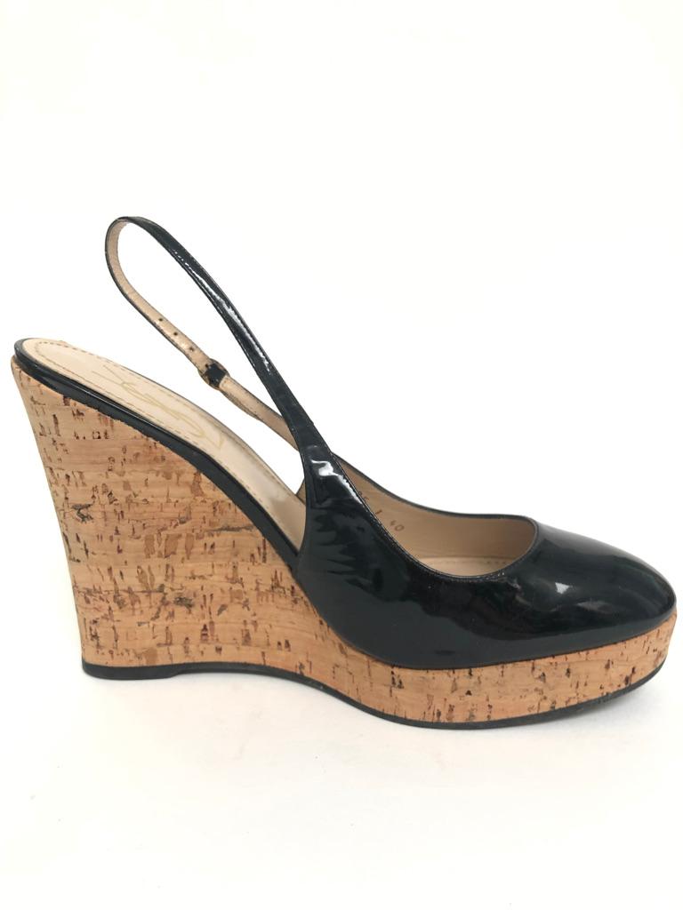 Cute cork wedge with a chic patent sling back.