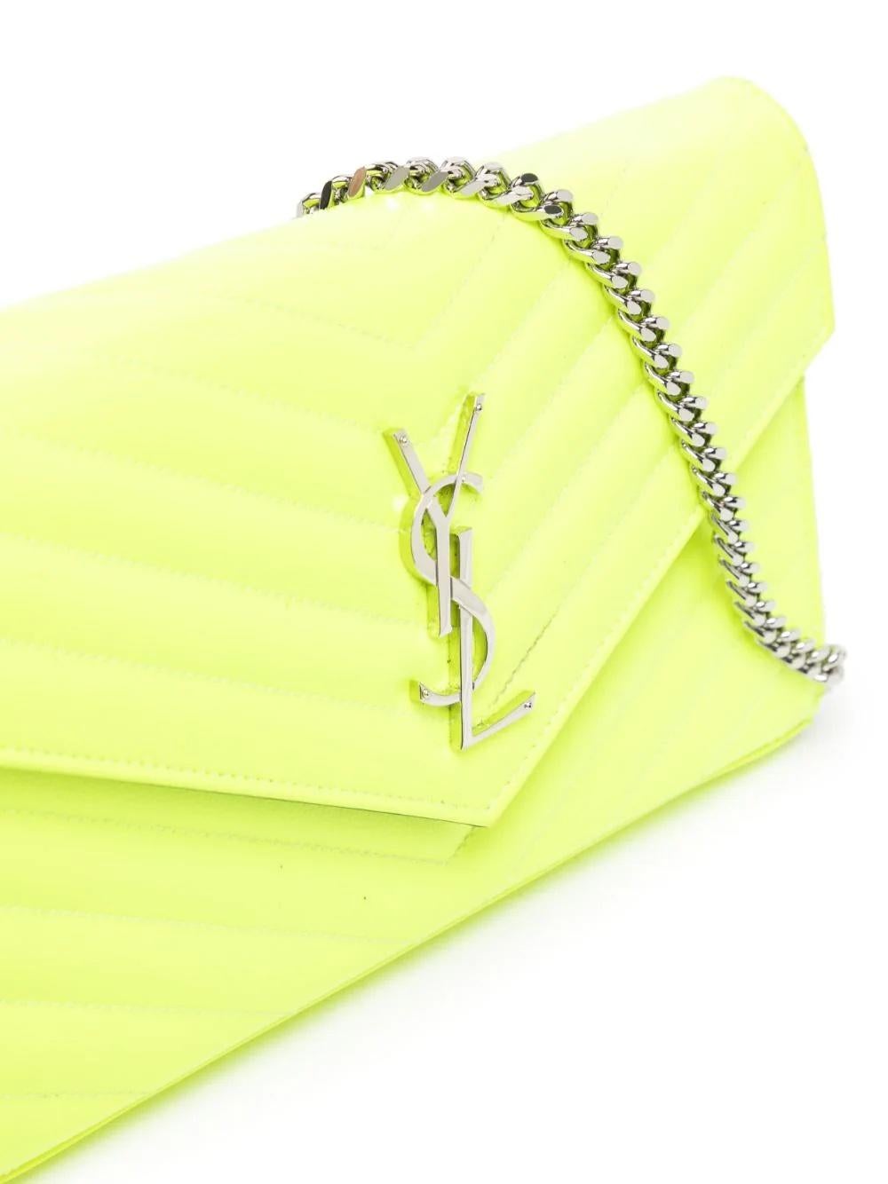 * Neon yellow
* Patent leather
* Signature V-stitch quilting
* Signature YSL logo plaque
* Foldover top with press-stud fastening
* Detachable chain-link shoulder strap
* Internal card slots
* Internal zip-fastening pocket
* Internal logo stamp
*