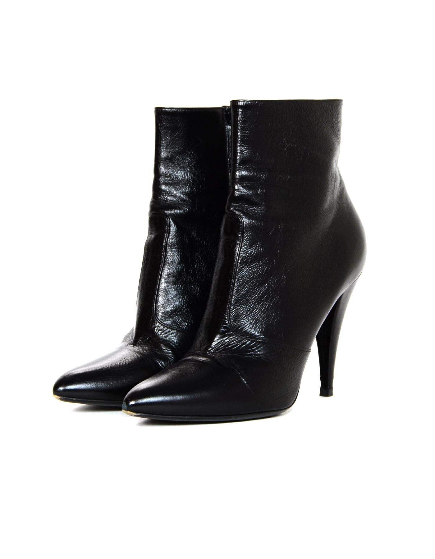 YSL Yves Saint Laurent Fetish Black Leather Ankle Boot Sz 40

Made In: Italy
Color: Black
Hardware: Black
Materials: Leather
Closure/Opening: Side zip
Overall Condition: Very good pre-owned condition with exception of some wear at toes and on back