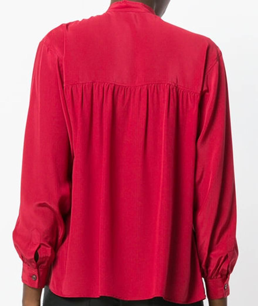 Yves Saint Laurent red silk blouse featuring a small straight collar front buttons, long sleeves with buttoned cuffs.
In excellent vintage condition. Made in France. 100% silk
Estimated Size 38fr/US6 /UK10
We guarantee you will receive this gorgeous