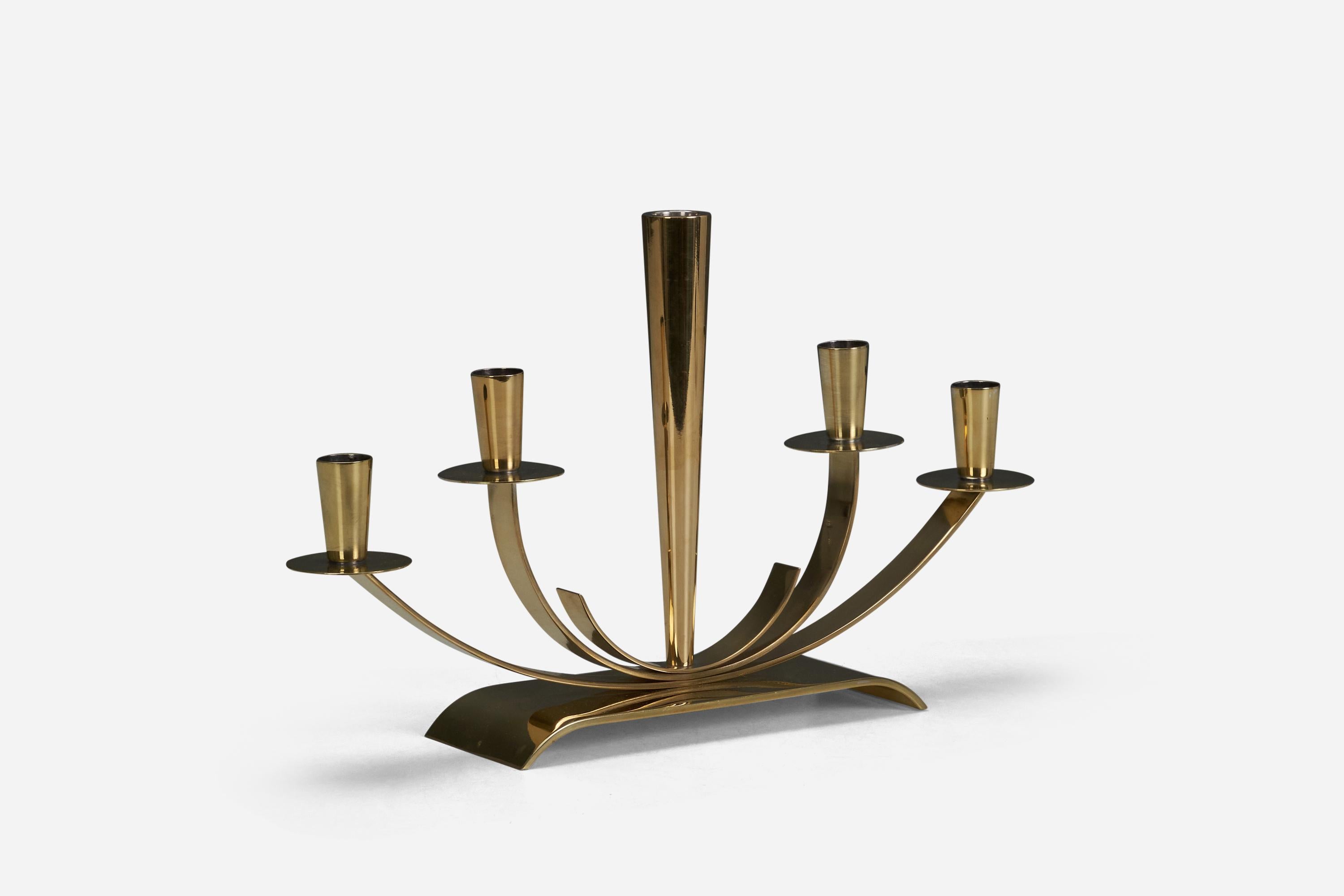 A brass candelabra designed and produced by Ystad Metall, Sweden, 1940s.