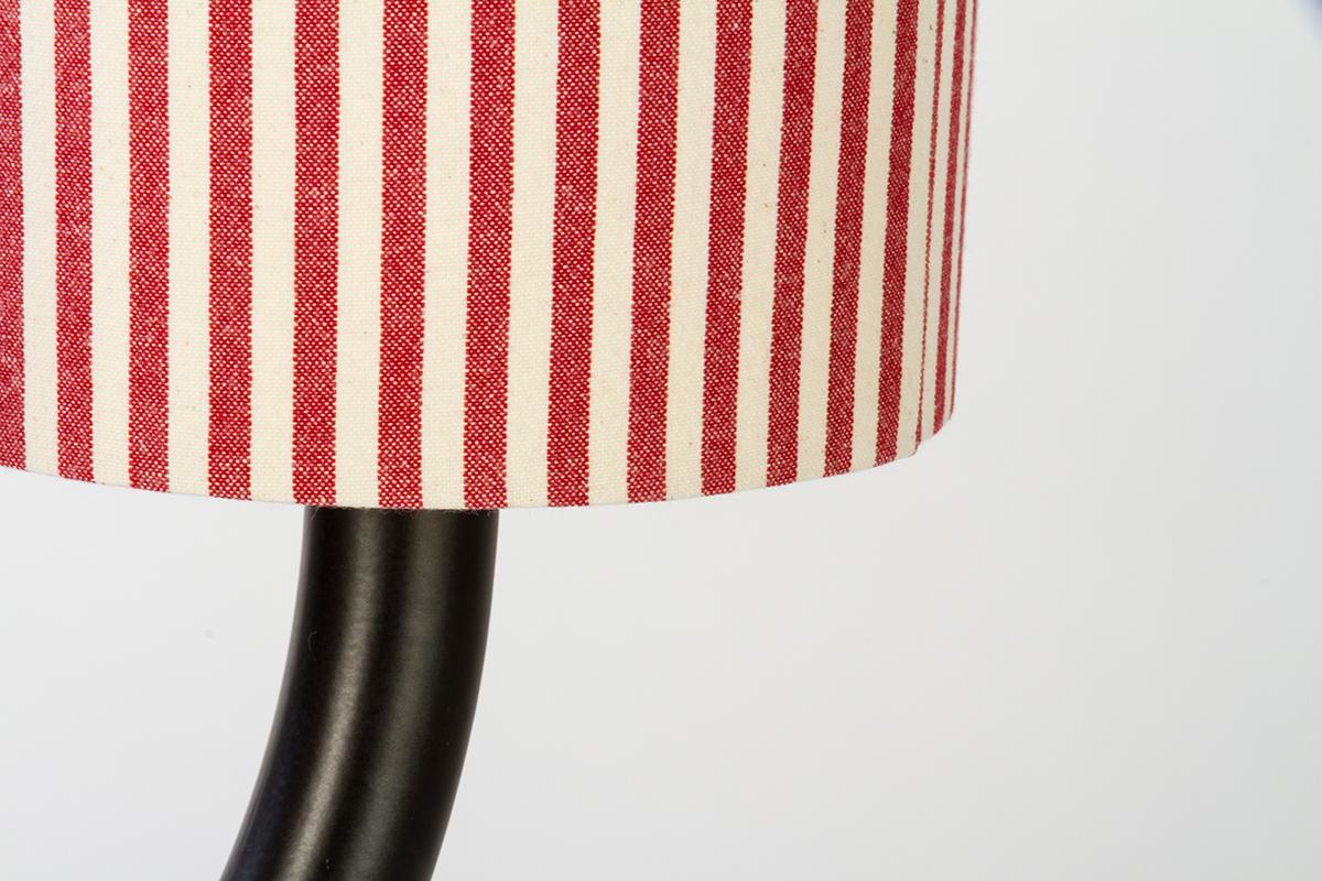 Ytree. Two-armed, anthracite-coloured glazed, ceramic table lamp from the famous ceramic district of Bassano del Grappa
and lampshades in white and red striped fabric.
This lamp designed by Aldo Cibic has been conceived as a joyful, luminous tree.
