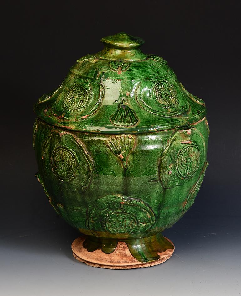 Chinese green glazed pottery covered jar.

Age: China, Yuan Dynasty, A.D. 1271 - 1368
Size: Height 35.7 C.M. / Width 27 C.M.
Condition: Well-preserved old burial condition overall.

100% Satisfaction and authenticity guaranteed with free