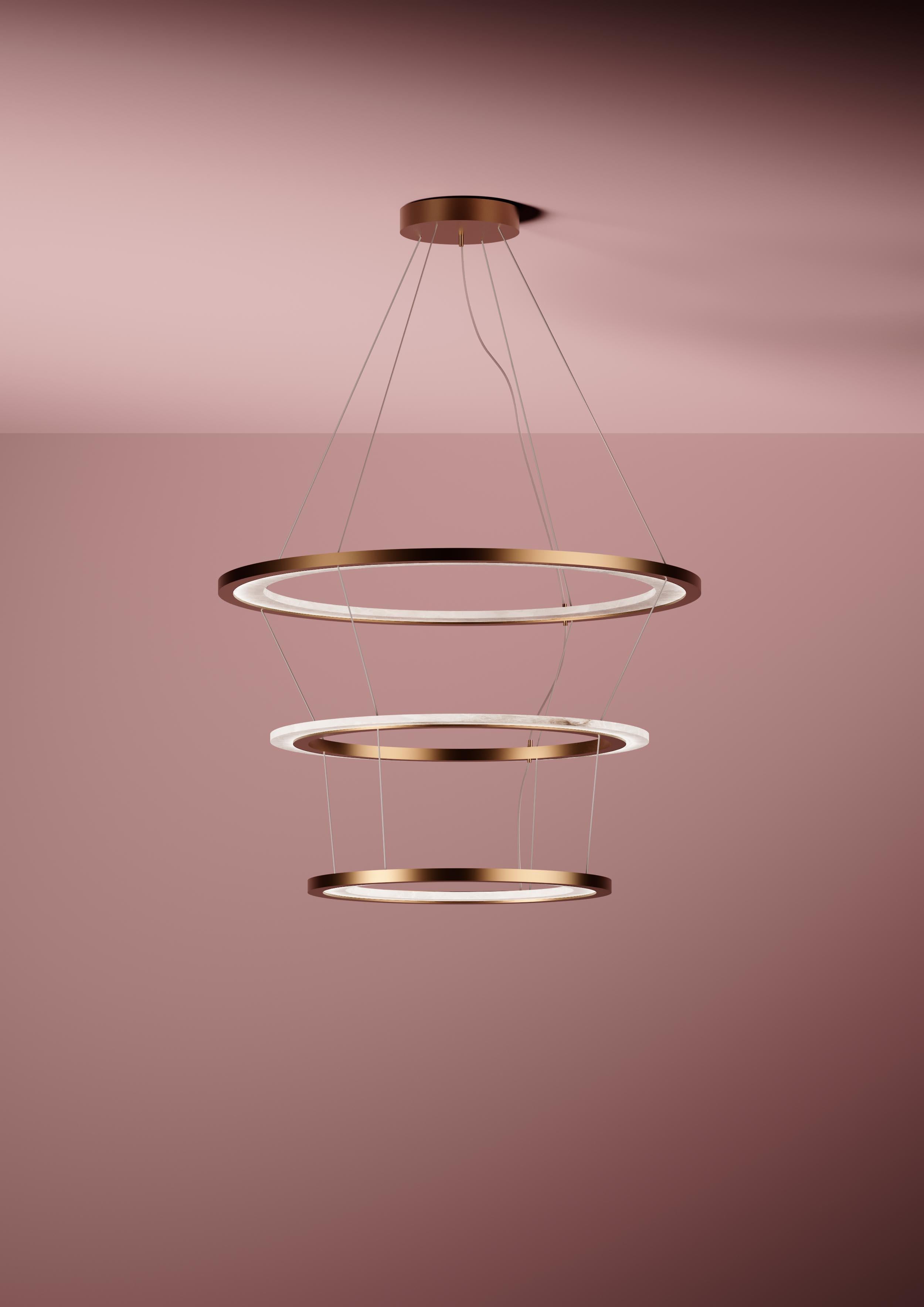 Lampada a sospensione Yubiwa con due anelli intrecciati di Alabastro Italiano
Dimensioni: P 80 x L 80 x OAH Max 300cm
Materiali: Alabastro, Metallo

Altre finiture metalliche: Argento lucido, Bronzo, Ottone spazzolato, Ruggine di Firenze, Brunito
