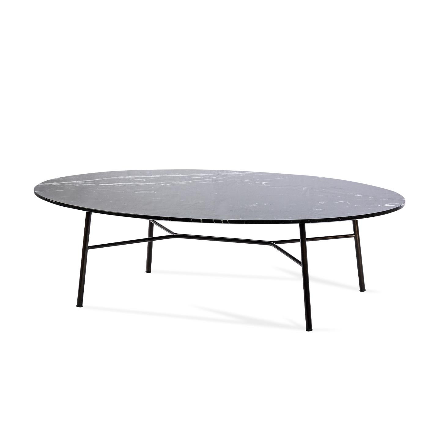 Boasting a dramatic monochromatic look, this coffee table will be a striking centerpiece in a modern living room, with its black Y-shaped metal base and black Marquinia marble oval top. This versatile design from the Yuki Collection merges