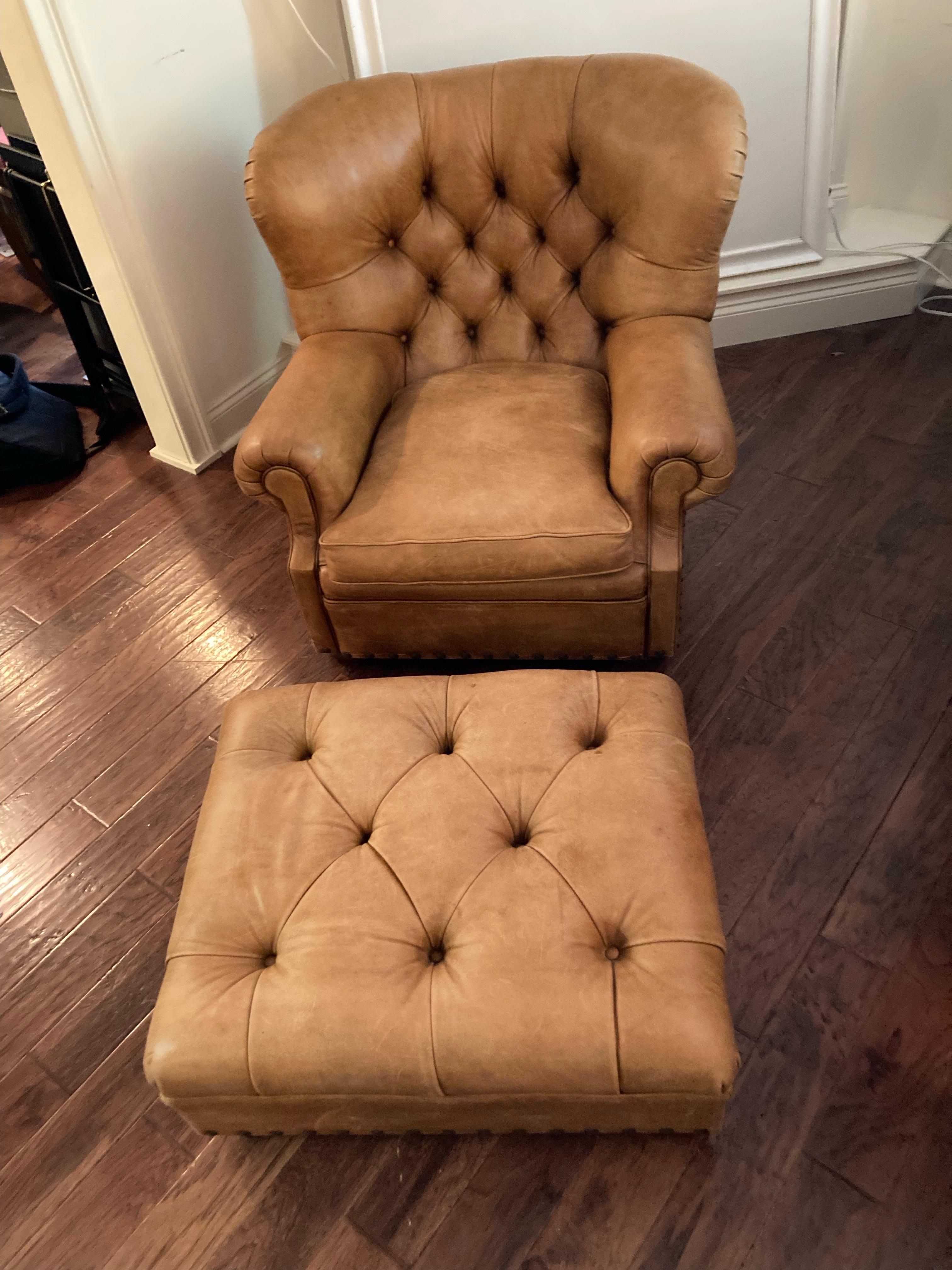 Classic and handsome buttery butterskotch tufted leather Writer's club chair and matching ottoman having mahogany bun feet and nailhead trim. Super comfy and inviting. Measures: chair: 41 W x 41 D x 36 H, arm height 22, arm width 8 between arms 21