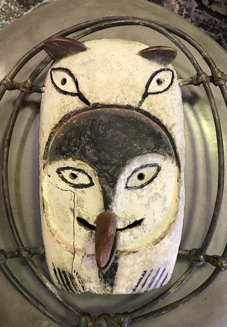 A fantastic and somewhat playful mask by the Yup'ik (Yupik) aboriginal, indigenous people of South-Western & South Central Alaska. The Yup'ik people, who are related to the Inuit peoples, have a long history of ceremonial mask making. Yup'ik masks