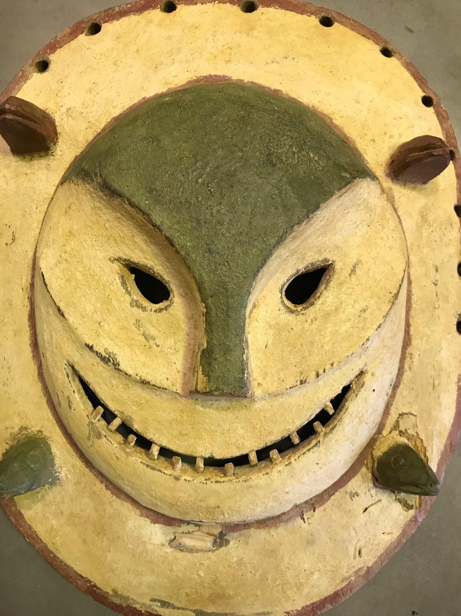 A fantastic, somewhat sinister appearing mask by the Yup'ik (Yupik) aboriginal, indigenous people of South-Western & South Central Alaska. The Yup'ik people, who are related to the Inuit peoples, have a long history of ceremonial mask making. Yup'ik
