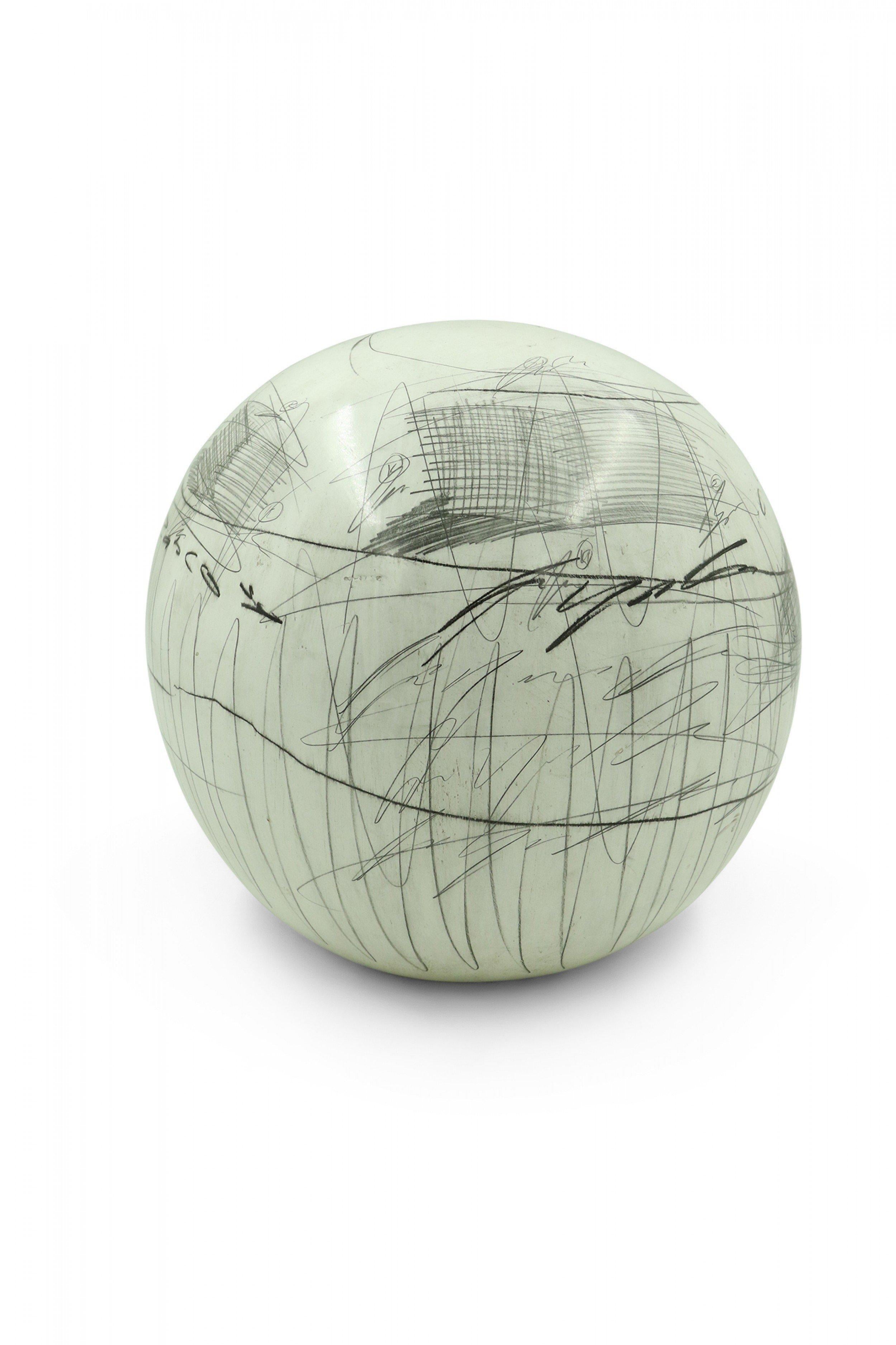 Contemporary large white ceramic decorative sphere with a printed pattern of pencil and charcoal equations, scribbles, and diagrams (designed by YURI ZATARAIN) (Matching decorative vase: NWL0651).