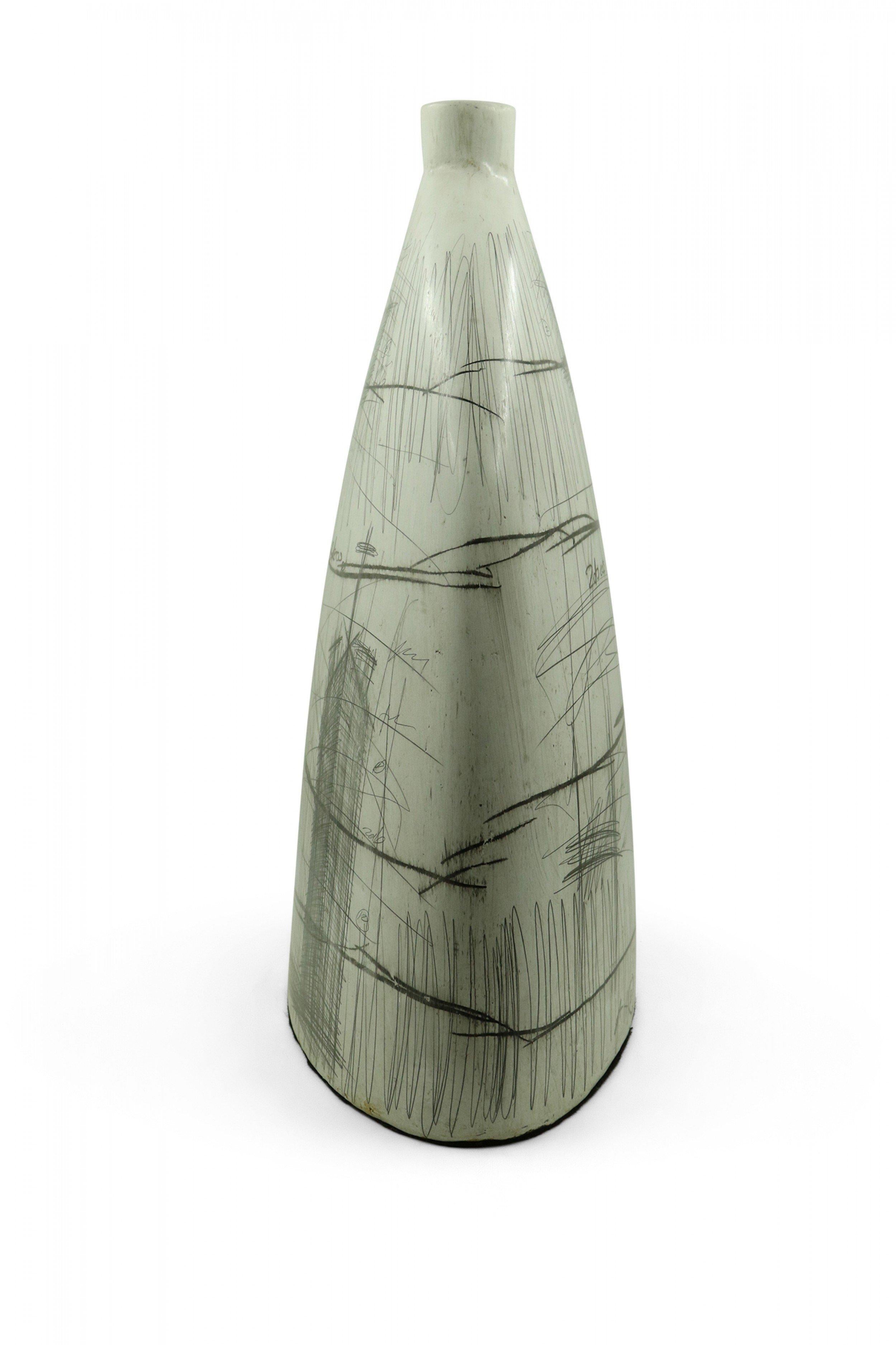 Contemporary large white ceramic decorative vase with a printed pattern of pencil and charcoal equations, scribbles, and diagrams. (designed by YURI ZATARAIN) .
     